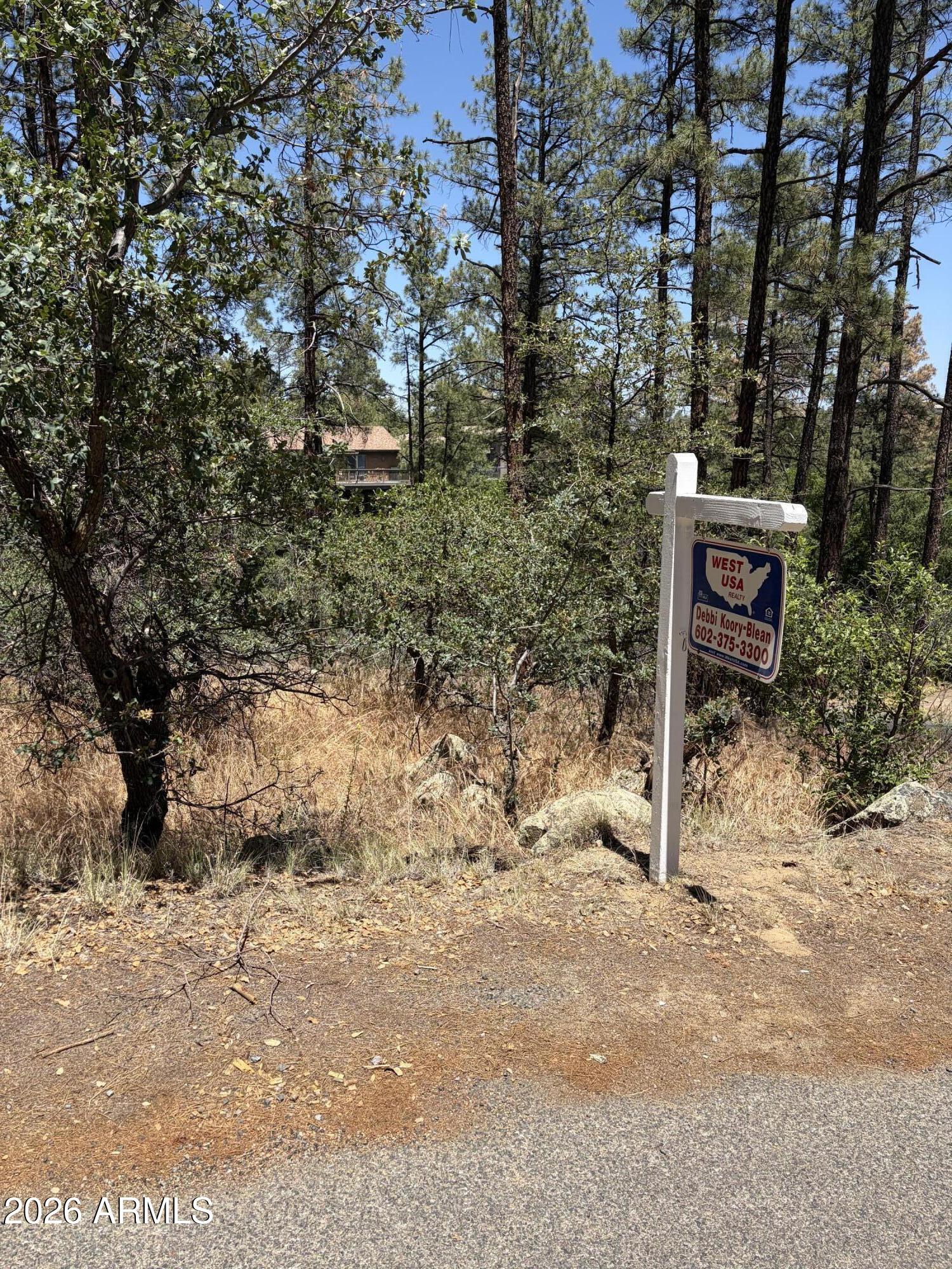 Large desirable lot in beautiful Prescott - Hassayampa Mountain Club. Priced to sell quick.  Perfect location for a second home or dream home.  Close to downtown  but still the feeling of being out in the country surrounded by the beautiful pines and countryside.  Currently no HOA or street address until the property is developed.