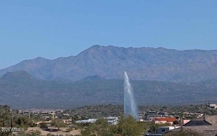 SEE THIS GREAT UNIT IN THIS GATED COMMUNITY. FANTASTIC BREATHTAKING VIEWS OF MOUNTAINS.  3 BEDROOMS WITH 2 1/2 BATHS, PRIMARY BEDROOM HAS PRIVATE BALCONY AND GREAT VIEWS OF 4 PEAKS. WITH PRIVATE BATH.   UPDATED KITCHEN COUNTERS AND CABINETS.  BOTH UPSTAIRS BATHS HAVE UPDATED COUNTERS. EXTRA SPACE IN THE LIVING ROOM AREA WOULD BE GREAT FOR OFFICE SPACE OR MISC.  PATIO OFF LIVING ROOM/KITCHEN AREA. .