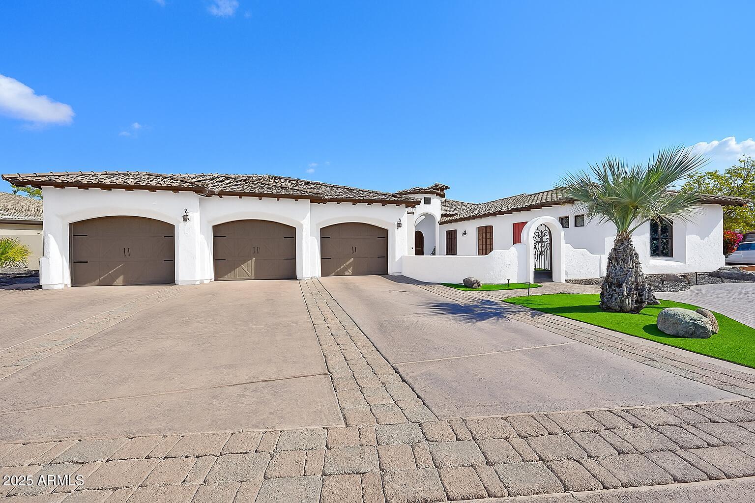 Experience Luxury Living in The Village at Litchfield Park! Welcome to your dream home in this exclusive gated community! This stunning custom-built residence offers 3 spacious bedrooms and 3.5 bathrooms in the main house, along with a private guest casita featuring its own full bathroom and kitchenette. Entertain in style with a large flex room that can serve as a theater room, and step outside to enjoy your resort-style backyard. The spa/pool combo is perfect for relaxation, while the sport court adds an element of fun and fitness. This home combines elegance and functionality, with high-end finishes and thoughtful design throughout. Don't miss your chance to own this one-of-a-kind property!