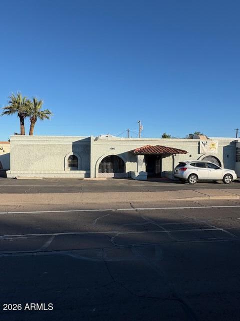 Here is your opportunity to own a C-1 zoned commercial property with Southern Ave frontage. Currently being used as a recording studio with long-term month-to-month tenants.
Permits uses such as small retail, personal services, offices and daycare. Detached apartment in back with alley access.
                   *** OWC w/35% down.***