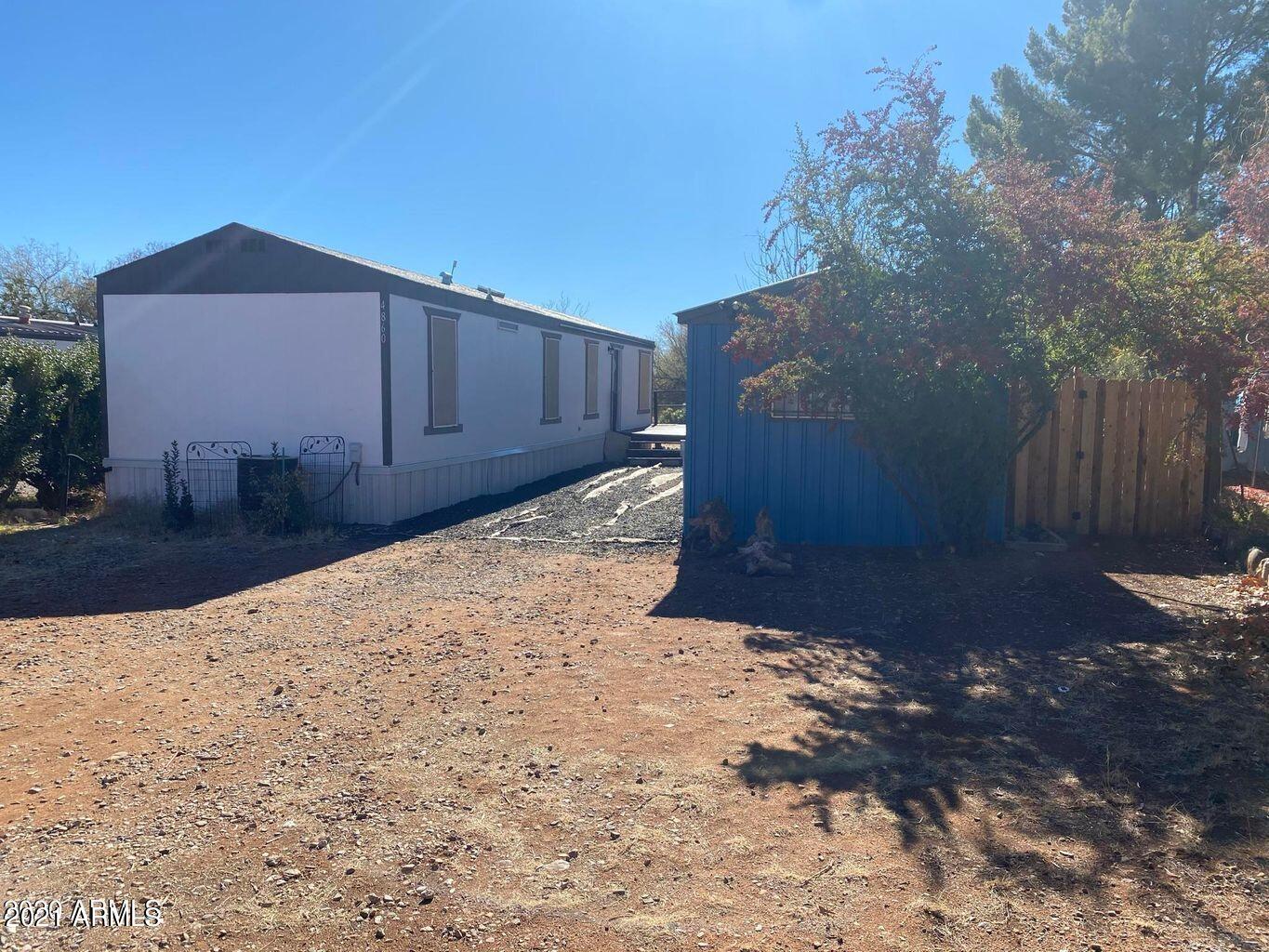 Remodeled 2 bedroom 1 bath home.. with large workshop, and RV parking!! Backs up to nothing!! Call today for your private showing!