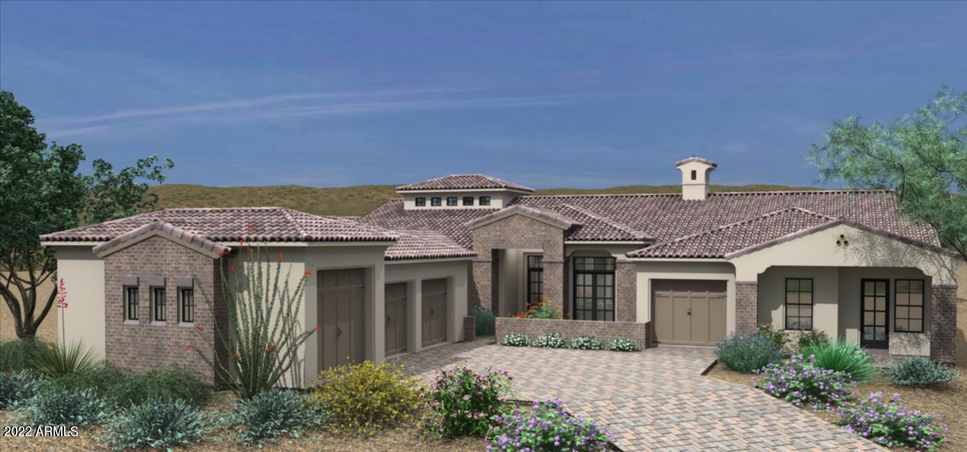 Exquisitely Designed Brand New Luxury Home in the Gated community of Sierra Boulders to be completed by Sept 2022. Single level w/ attached Casita on 1.25 acres. Completed front and backyard landscape with Pool/ Spa & Outdoor Cooking area in sunken ramada. The Open concept floor plan was designed for indoor/ outdoor living with a 16 foot pocket door & front patio. Light bright & beautifully designed. 4 spacious beds w/ On-suite baths & walk in closets, & large bonus room which could be a 5th bed or movie room.  Attached guest quarters includes 1 bed, 1 bath, living room, separate entrance & garage. Primary Bed has spa like bath w/ shower & soaker tub & walk in closet. Office, formal dining room with bar area, mud room, large laundry room & pantry.  4 garage stalls one with HVAC! Kitchen will have quartz counters, Thermador: Gas cooktop, separate built in fridge and built in freezer and wall oven. custom hood and open shelving. Microwave built into island. Double kitchen islands, 2 dishwashers, wide plank hardwood Oak flooring, black and rift oak cabinets and wood beams. Gas fireplace with built ins. Bar area in the formal dining room. Custom smooth wall finish with satin paint,7" baseboards, shaker style doors, Pre-wired smart home, security system and surround sound. Central Vac & soft water loop hook ups, tankless gas hot water heater. EV charger in garage. Heated pool & spa, travertine & Limestone pavers and turf. Entertainers dream home! All this in a quiet North Scottsdale neighborhood.