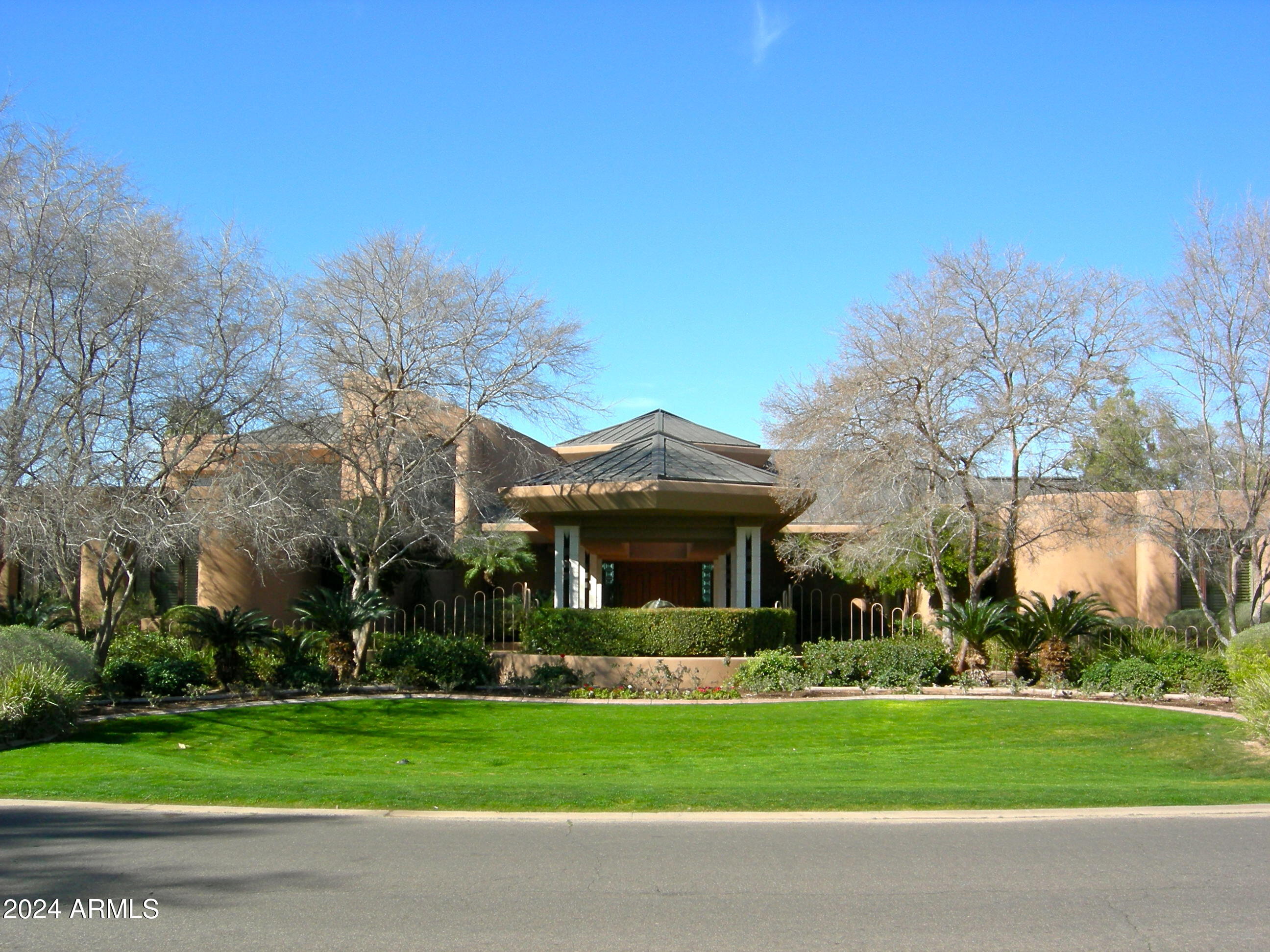 Now priced at $448.53 per SqFt for this one Owner, phenomenal and timeless residence designed by Vernon Swaback, Architect and Apprentice to Frank Lloyd Wright. The resort-like grounds offer 1.668 acres and is located on an Estates Golf Course panoramic view lot. A truly majestic home featuring a 2,100+ SqFt Great Room, a soaring angular skylight, recessed wet bar, a kosher Kitchen created for event catering, limestone columns and surfaces, copper details, 2 Powder rooms + hall 1/2 Bath, Brazilian hand-scraped cherry floors, exceptional millwork, outstanding Master Suite & Spa room, wonderful study, workout room, TV/game room, all en suites plus a live-in/nanny wing. Meticulously built of steel framing and distinctive copper roofing, as well. Home: 12,503 SqFt; Guest house 863 SqFt.