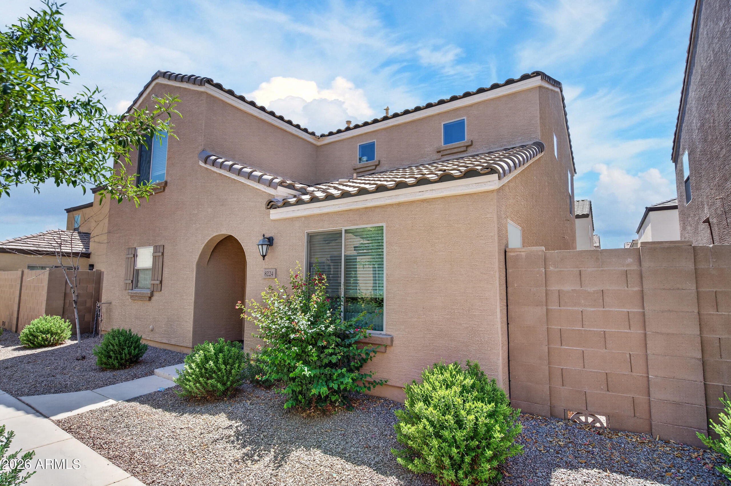 This beautifully maintained, move in ready 2 story home is in the desirable Tuscano community of West Phoenix and has a thoughtful and flowy floor plan. The modern kitchen features granite countertops, SS appliances, and a seamless flow into the living and dining room. It is a great set up for both everyday living and entertaining friends and family. Upstairs, you'll find a convenient laundry area and comfortable bedrooms, including a private master suite. The neighborhood is located near major freeways, shopping, dining, fantastic schools, and employment centers. Overall, this home has it all.... modern comfort, affordability, and accessibility. Welcome home! 1% FLEX CREDIT TO BE APPLIED TOWARDS CLOSING COSTS OR RATE BUYDOWN, OFFERED BY PREFERRED LENDER FOR QUALIFIED BUYERS.