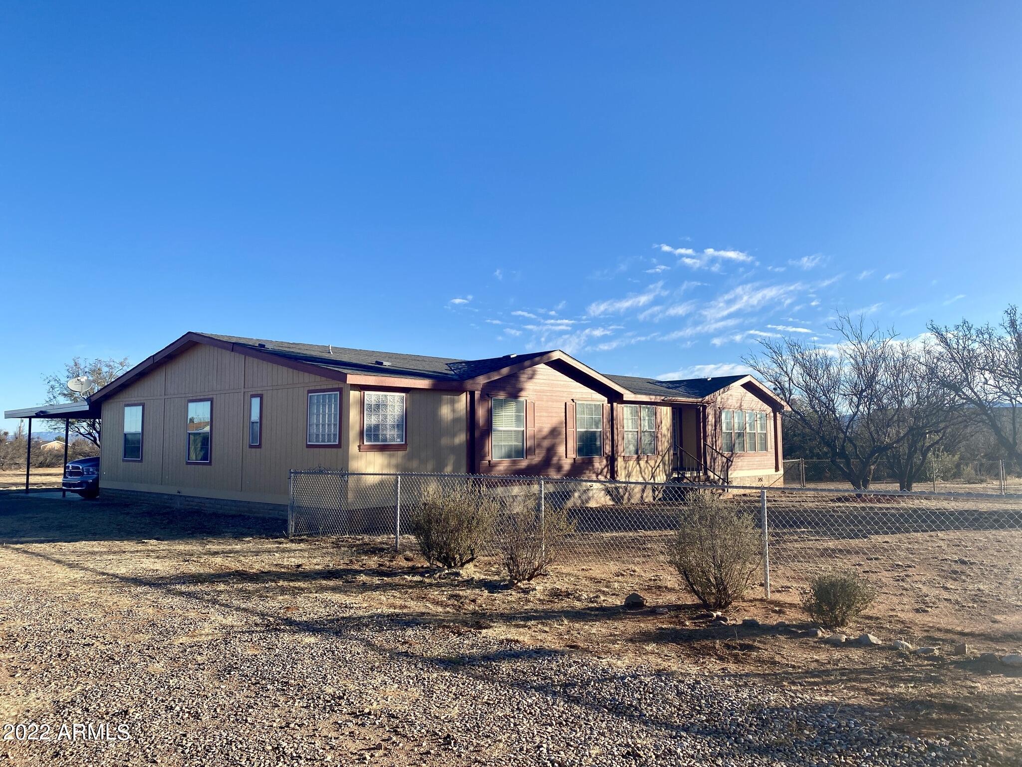 You'll be surprised the first time you step foot into this triple-wide monster of a place with 2880 feet of gorgeous freshly renovated living area. Sitting on 4 acres, this house has 3 bedrooms plus 1 office and 2 ½ bathrooms. Very bright and spacious kitchen with walk-in pantry with lots of cupboard space. Huge laundry room with lots of extra space. The primary bed and bathrooms are huge! Lots of natural light throughout. Propane hook-up on the back patio. Call to schedule your private showing!