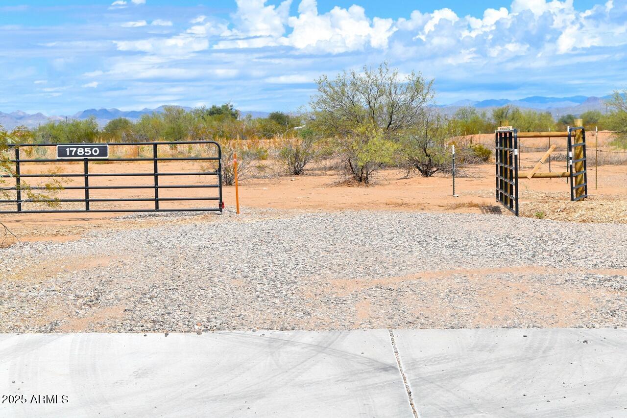 A singular opportunity for a builder who wants a superb project in the rapidly growing city of Surprise!  4X lots in a new rural subdivision located right on a landscaped parkway across street from the Desert Oasis Phase 3 subdivision.   It used to be a community gardening project a previous owner had.  The approach and a culvert are already built, and there was already water service on the property. Please note all the items on the survey plat, and discuss your plans with Surprise for details and stipulations.  This property sets up beautifully for a builder to put custom homes into place in a high demand high growth area.  Seller might consider individual lots; please inquire with broker. *an owner of this parcel holds AZ real estate License.
