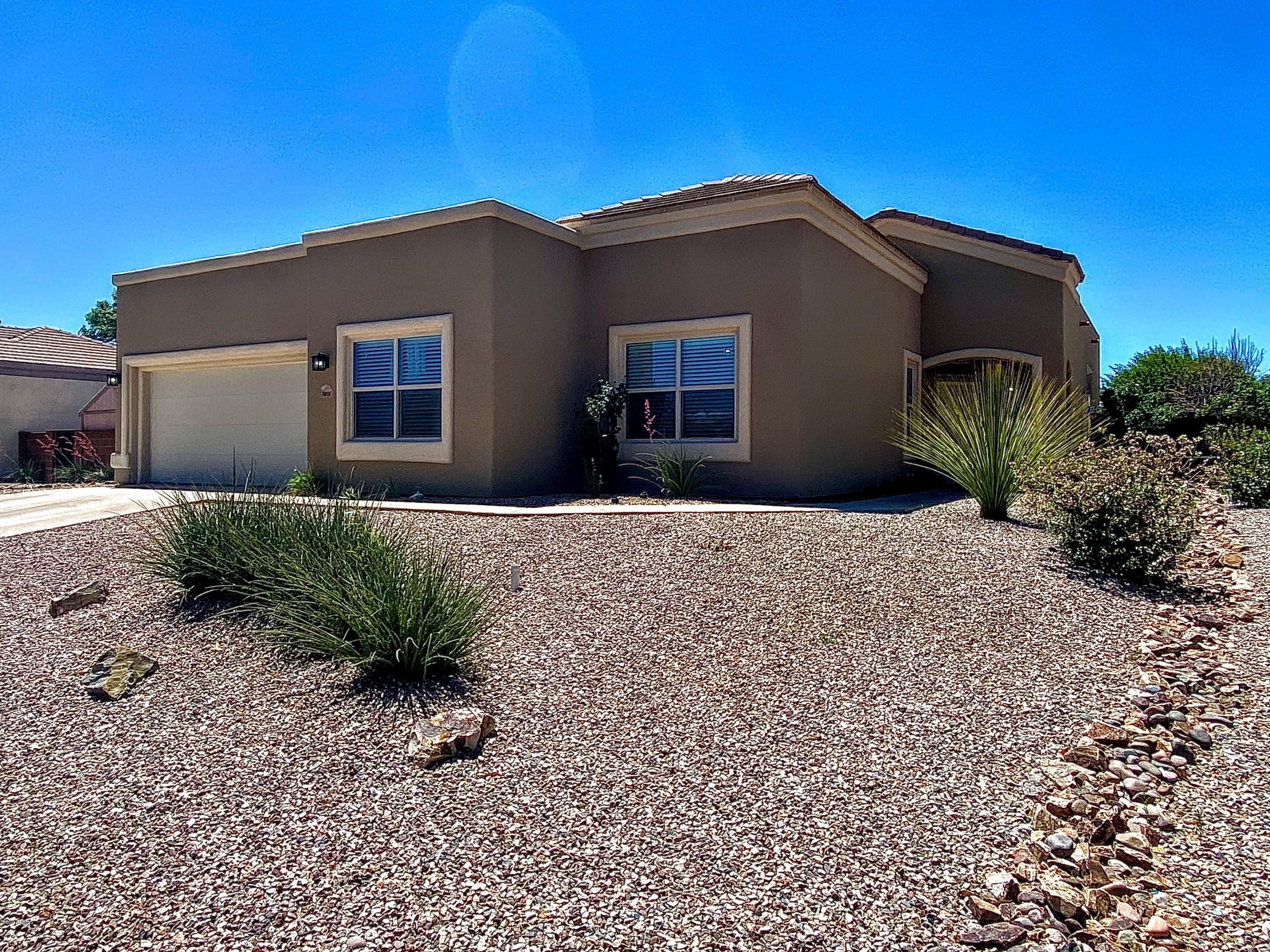 Home sweet home! Absolutely beautifully remodeled home in the heart of Sierra Vista. Updated in 2018, this 4bed/2bath popular open floorpan has new exterior stucco, new roof coating, new interior and exterior paint and wood-like tile throughout. Water filtration system installed and equipped to provide reverse osmosis system. Kitchen, Master bathroom and guest bathroom fully remodeled with granite countertops and designer fixtures. Large floor to ceiling windows in the family room provides natural light and overlooks the beautiful and peaceful backyard low- maintenance landscape. 20x20ft detached garage offers plenty of extra storage space. The list goes on and on!