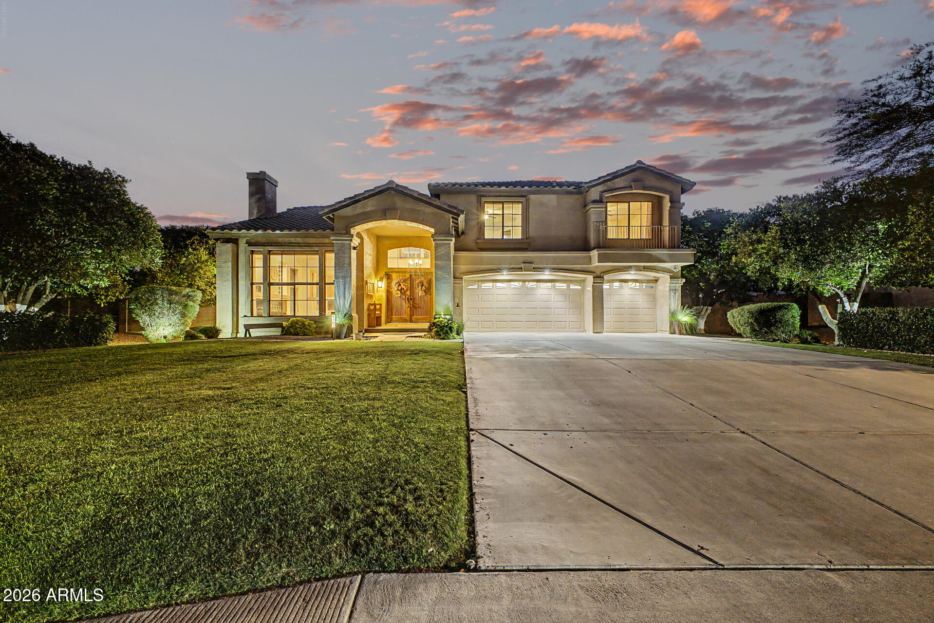 Wake up to quiet, tree-lined views in this spacious luxury retreat tucked inside the gated Mahogany community. Set on a half-acre lot for extra privacy, this home is designed for both everyday comfort and effortless entertaining. The gourmet kitchen with granite counters and stainless appliances anchors the home, while custom dual Arcadia doors in the family room frames seamless indoor-outdoor living--opening to the lush backyard with a sparkling pool and heated spa. Cozy up to the new fireplace or hang out at the bar. Upstairs, a flexible loft with closet adapts to your needs. The primary bedroom features his and her separate walk in closets, soaking tub and separate shower. Two additional beds features en suites. All this  and steps from a park and play area. Over $160K in updates!