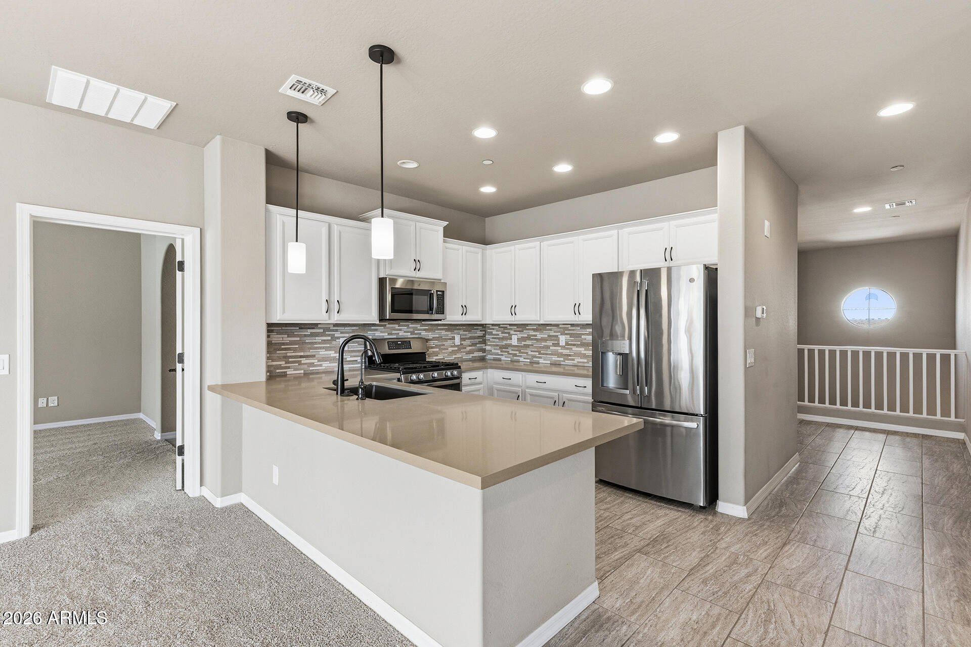 CACHET AT THE WIGWAM CONDOMINIUM - Residential