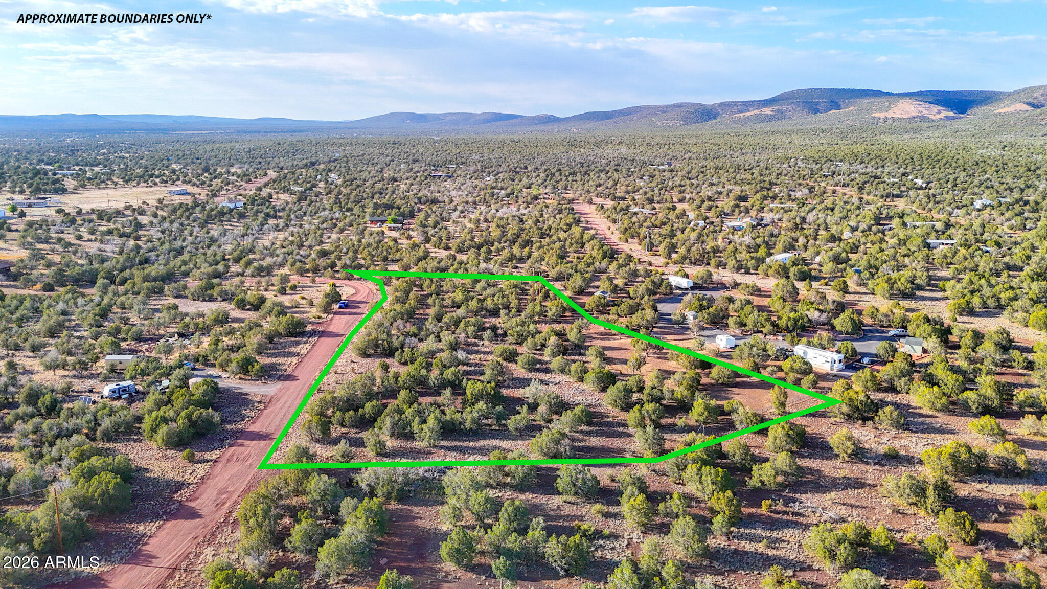 3.25 acre lot just steps from Kaibab National Forest! Enjoy cooler temperatures at 5,700+ ft elevation, juniper-covered landscape, and endless recreation opportunities. Perfect for an RV getaway, off-grid retreat, tiny home, horses, or future homesite. No HOA and no known building restrictions outside county ordinances!