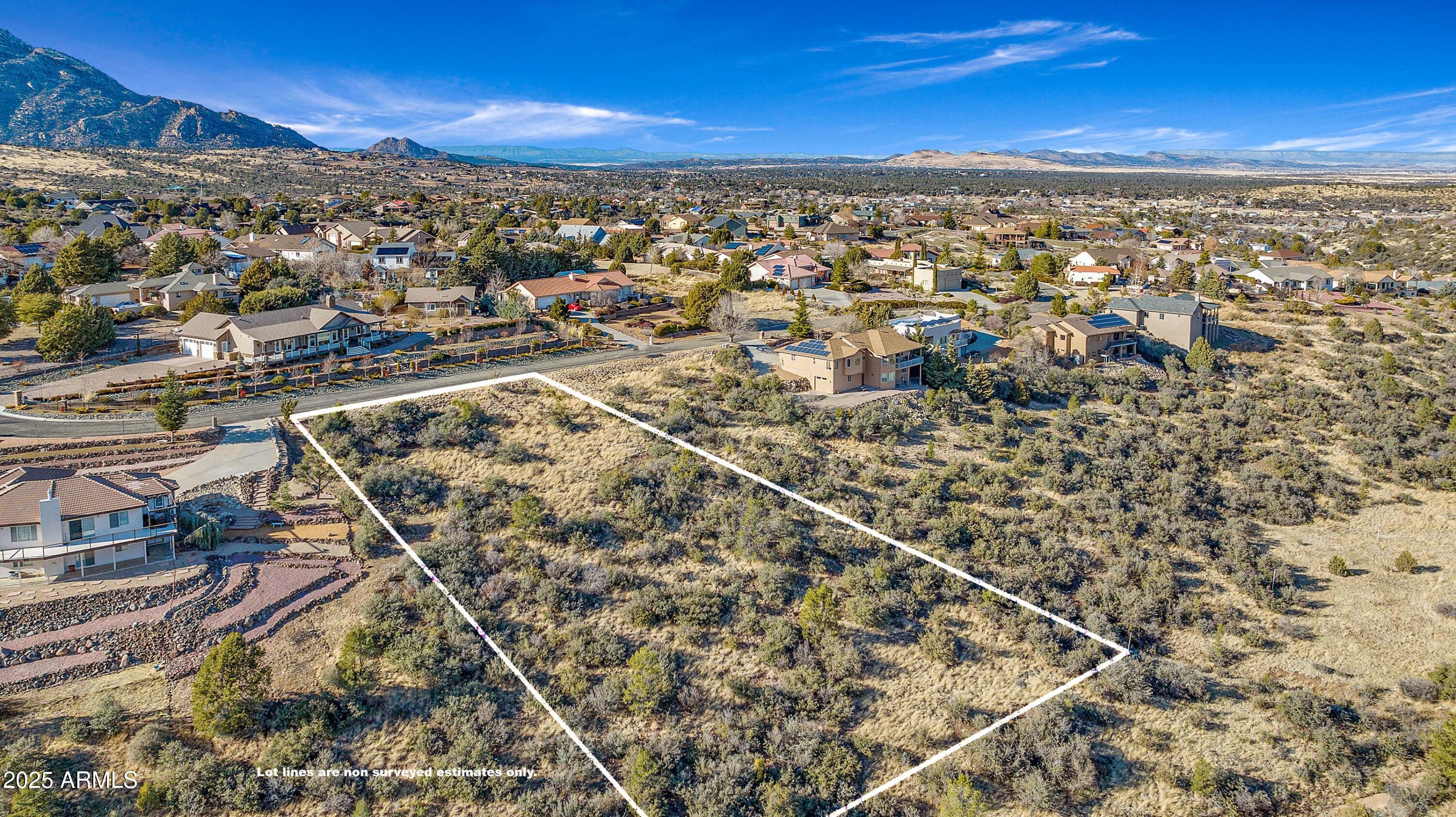 Spacious lot in Longview Estates in a quiet setting close to town. One of a few lots available in this very desirable subdivision with extraordinarily low annual HOA dues of $50. This beautiful lot would accommodate a quality built home with a walk out basement. Home construction must meet the 1800 square feet minimum for the main floor. Longview Estates features custom homes that are exquisitely maintained with a variety of architectural styles. You can drive to Historic Downtown Prescott in less than 15 minutes. You will be close to all your shopping interests, medical facilities, restaurants & loads of outdoor activities, hiking/biking trails, and nearby kayaking opportunities. If you love the equestrian lifestyle you will be minutes from riding trails and nearby stables.