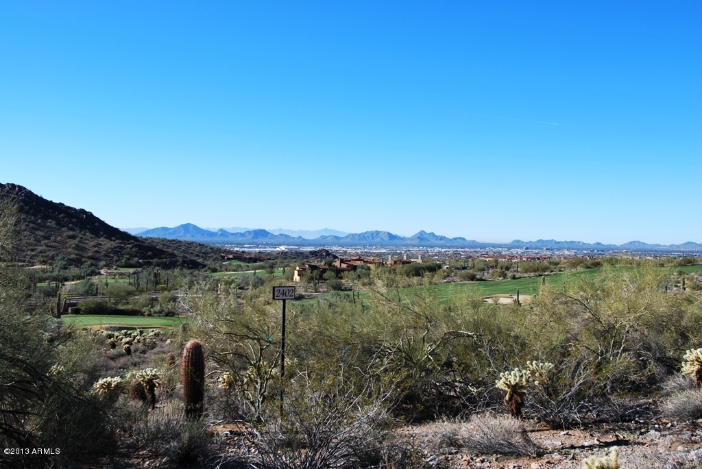 Golf Course lot 2402 - One of the most dramatic and desirable custom homesites in the Silverleaf community. Located in the private Horseshoe Canyon, above the 14th green of the Silverleaf golf course. Stunning, unobstructed views of three golf holes, city lights and the Silverleaf Golf Club & Spa. This estate lot offers a large 48,186 sq ft building envelope and a total lot area of 2.1 acres all within close proximity to the Silverleaf Club and Spa. Please see the documents tab for detailed lot information.