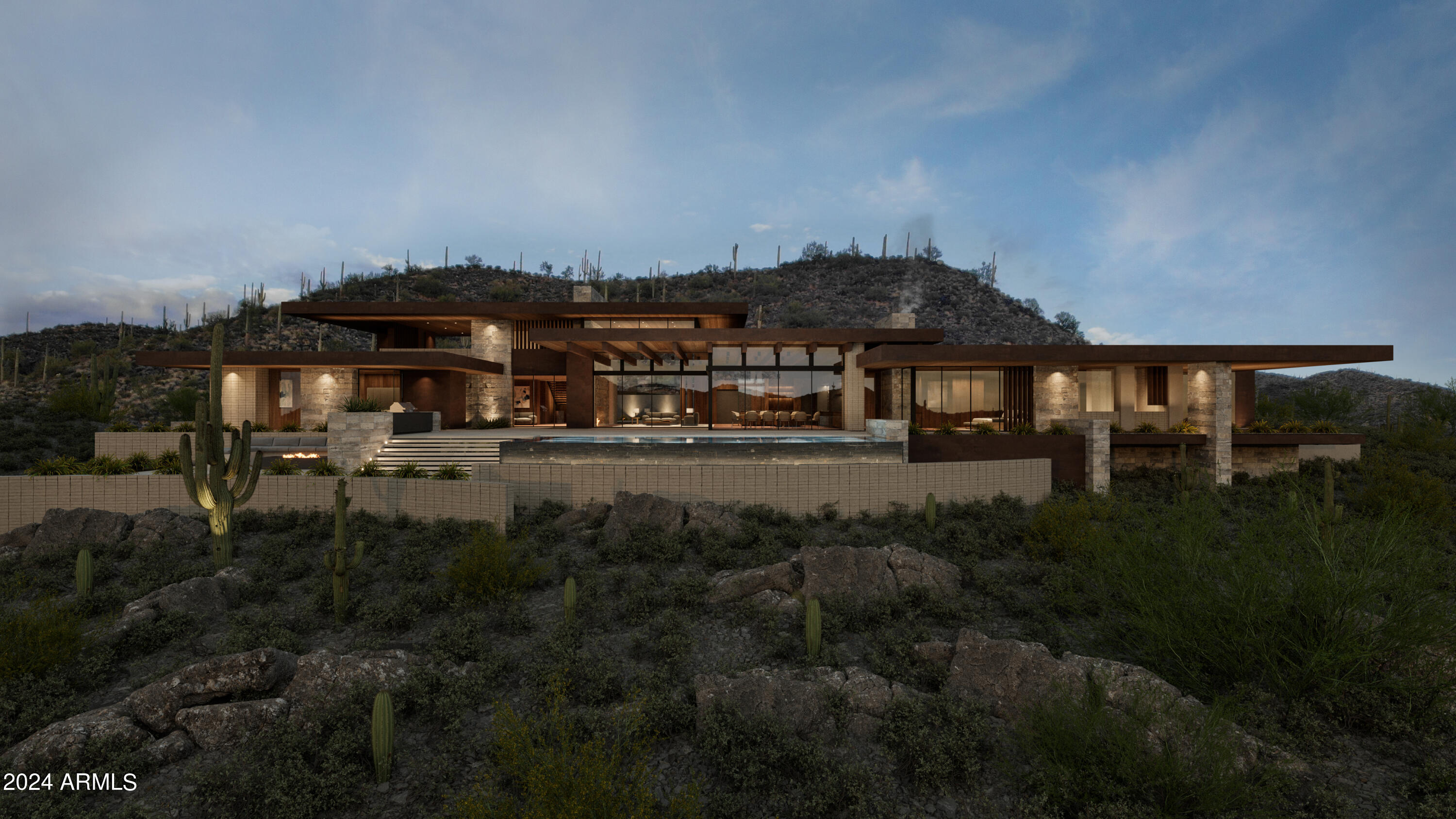 The Mustang residence is nestled on 4.7 acres with breathtaking 360-degree mountain views. Facing southwest, this residence perfectly captures the tranquil surroundings, offering a seamless blend of indoor-outdoor living on a single-level split floorplan. The warm and organic material palette, features stone, wood, steel, and glass. The heart of the home unfolds as you step inside, revealing an open living, kitchen, and dining space. This central hub is designed for both relaxation and entertainment, with the flexibility to open the floor-to-ceiling pocket doors during the season. The outdoors is an entertainer's dream, boasting an infinity pool that seemingly merges with the horizon, set against a backdrop of majestic mountains. Descend from the deck to enjoy an outdoor lounge centered around a fire pit creating the ideal setting for relaxed social gatherings. The rooftop, immersed in the saguaro forest, invites you to experience everyday magic during the golden hour or revel in solitude under the stars.

In this home, every detail has been meticulously crafted to provide a sophisticated and harmonious living experience. Welcome to Continental Mountain Estates, where modern luxury meets the "Old West".