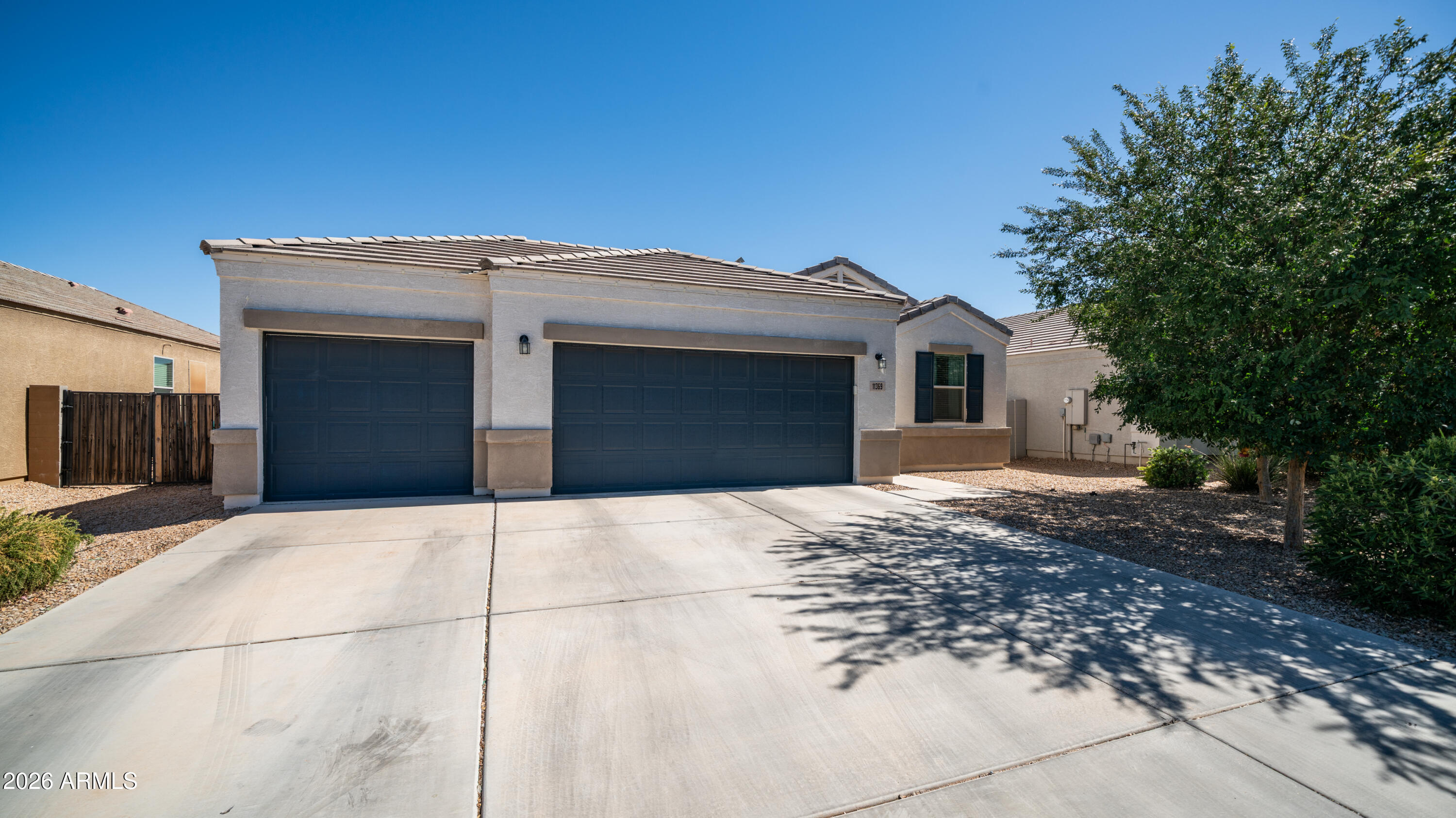 Welcome to this beautifully maintained home featuring a rare 3-car garage and an inviting great room floor plan with durable 16-inch tile flooring throughout. The open-concept kitchen offers a center island, stainless steel appliances, and plenty of space for cooking and entertaining. The split primary suite provides privacy and includes a spacious walk-in closet and walk-in shower. Custom paint, upgraded lighting, and tasteful finishes add style throughout the home. Enjoy the community amenities, including a pool, tennis courts, and basketball courts. Conveniently located with both the elementary and junior high schools within the subdivision, this home offers the perfect combination of comfort, convenience, and lifestyle.