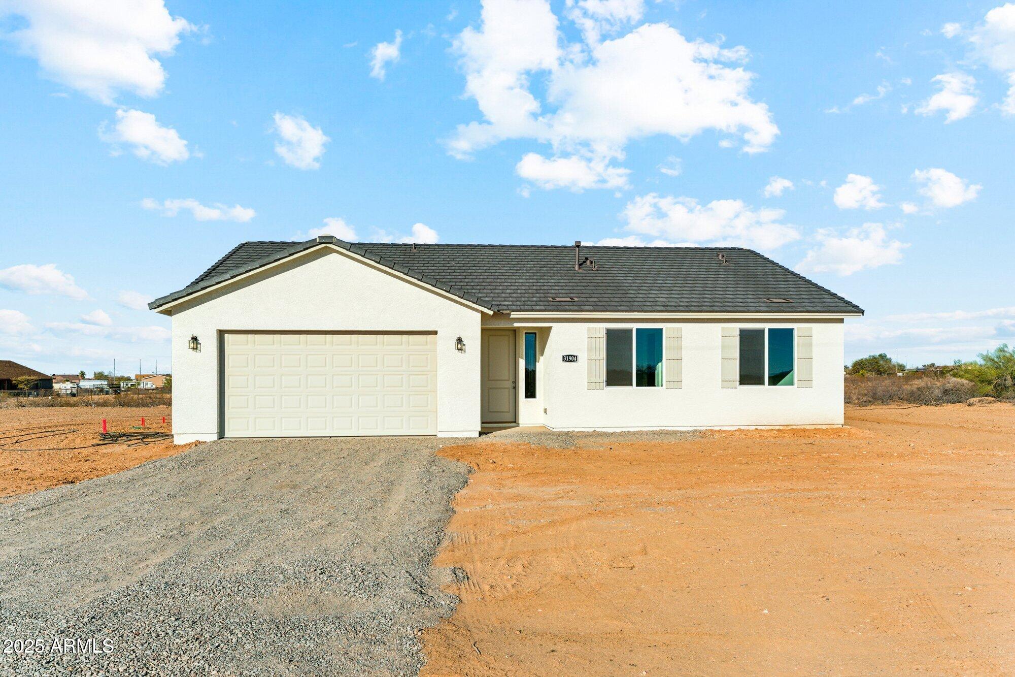 $12,000 SELLER CONCESSION IS APPROVED (SEE REMARKS), THIS HOME IS COMPLETED AND MOVE IN READY!!!!!!!!!!!!!!!!!, BRAND NEW 1,658 SQ FT, 3 BED/2 BATH SINGLE LEVEL HOME ON A 1+ ACRE LOT WITH NO HOA'S, BRING YOUR HORSES, TOYS & RVS!! THIS HOME HAS GREAT CURB APPEAL, INSIDE YOU WILL FIND THE MOST CHARMING KITCHEN-GREAT ROOM OPEN FEELING WITH VAULTED CEILINGS & AN UPGRADED OVERSIZED KITCHEN ISLAND, MODERN WHITE SHAKER CABINETS THROUGHOUT, QUARTZ (WHITE WITH GRAY VEINS) COUNTERTOPS, CERAMIC WOOD PLANK TILE (GRAY) COVERS THE FLOORS EXCEPT FOR THE CARPET IN THE BDRMS. THE MASTER FEATURES A WALK-IN CLOSET ALONG WITH A QUARTZ TOPPED DOUBLE SINK VANITY. PHOTOS ARE FROM PRIOR HOMES AND REFLECT UPGRADES, GREAT CORNER LOT, THIS HOME IS COMPLETED AND READY FOR A NEW FAMILY TO MAKE MEMORIES!!!!!!!!!!!!