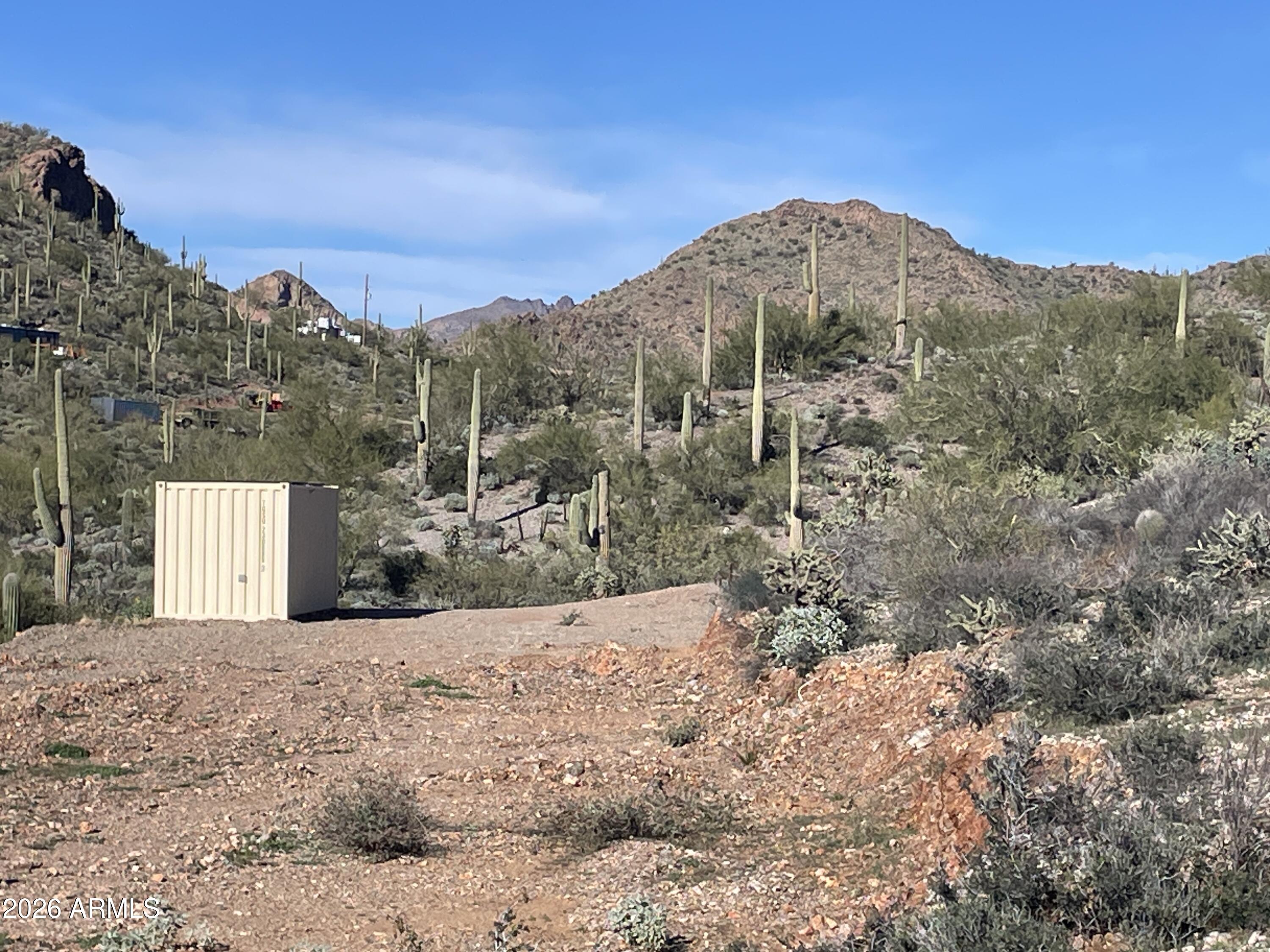 This parcel has been cleared and ready for your vision and development. Right off of Elephant Butte Road, enjoy living in the quiet of the Arizona desert. This parcel is close to State Forest land and the Tonto National Forest. Electricity can be pulled to the parcel, as power lines are along the road. Water can be hauled or dig a well. The only time line to build is yours. Bring your plans and build your getaway. Conex will stay with a full price offer (Conex has solar power).  Buyer to verify all facts and figures important to them.