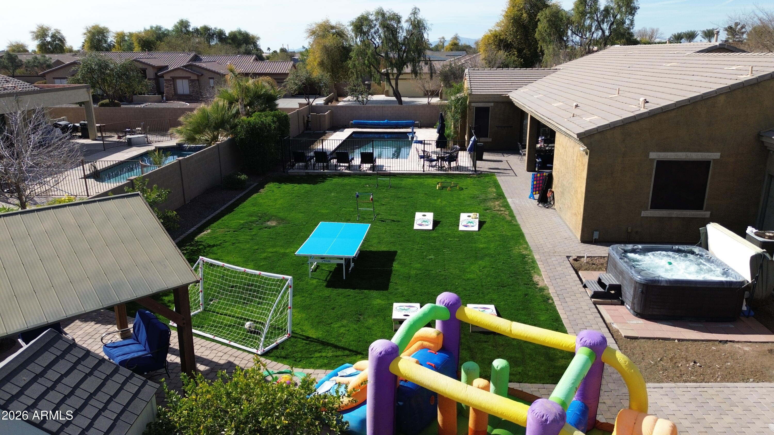 Over 100k in upgrades/renovations added in the last 18 months! This home has it ALL! NEW: open floor plan, flooring throughout, kitchen appliances, expanded pool deck upgraded to travertine, spa, BBQ island with fire features, Top of the line Aquacal pool heater, 12' RV gate and parking pad. This gem has a large corner lot, 4 car garage, gated community of all 1 story homes, RV parking allowed, R/O system, water softener, split floor plan, outdoor fireplace with Gazebo, 9' ceilings, plantation shutters and the list goes on! The work has been been done for you so you can relax and enjoy!!

Turn-key STR possibilities. No HOA limitation on rental term. Generated over $73k in STR revenue in 6  months from Oct 2025-March 2026 BBQ Island, Spa, and TVs do not convey but they are available by separate agreement as with ALL furniture and contents in the house