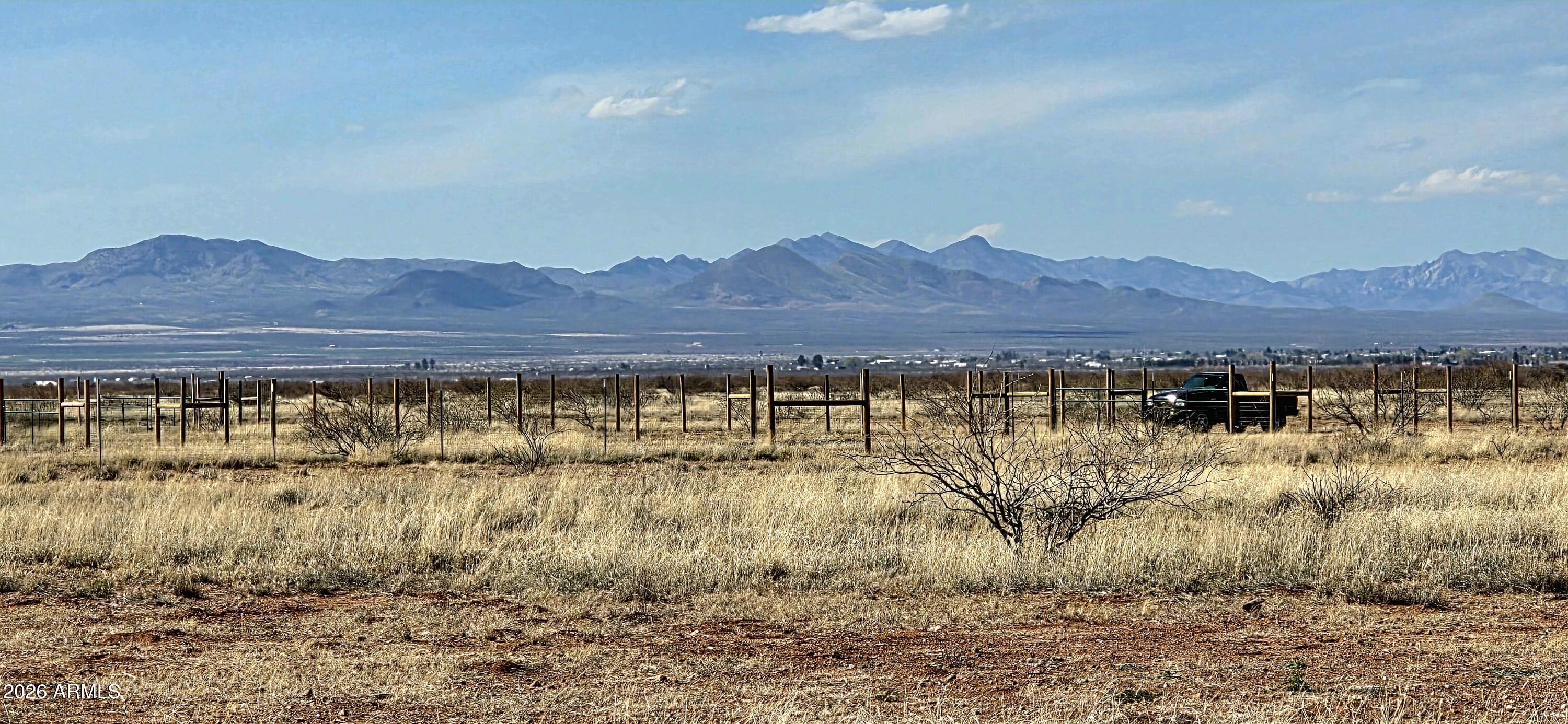 Views! Outstanding views from this parcel! This 4.93 acre property is level and cleared, many potential building sites. There is a 1,500 gallon septic tank and drain field installed. A potential building site is fenced and cross fenced. Property is zoned RU-4, site built or manufactured homes allowed. Utilize the Owner Builder Opt-Out and build your dream! Fema Zone X. Easily traversed dirt roads to the property. Buyer to verify all facts and figures.
