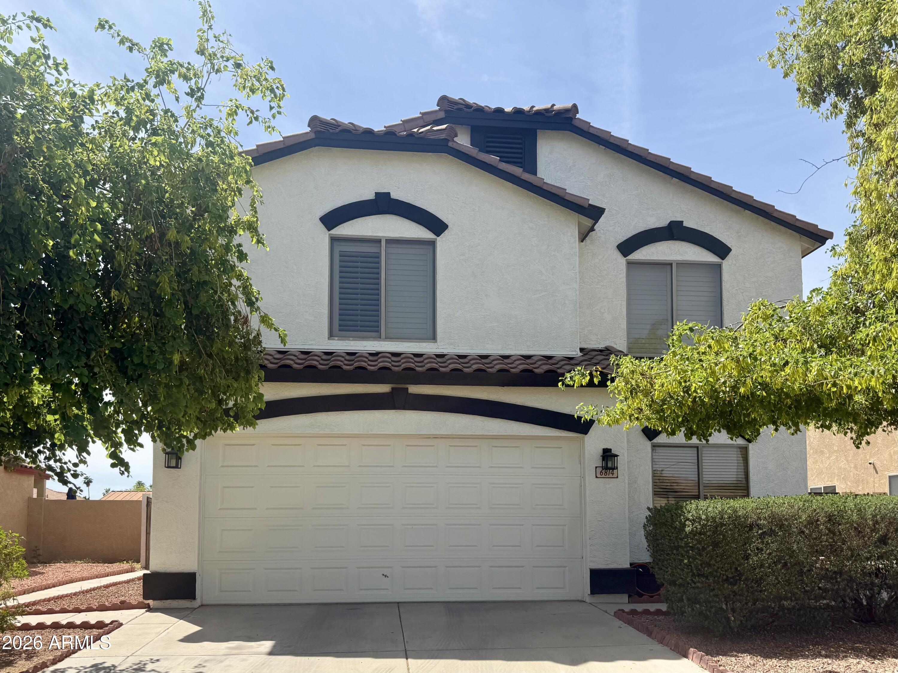 Beautifully updated home in the heart of Glendale featuring a spacious and versatile layout! This 4-bedroom residence includes a downstairs den--perfect for a home office or guest space--and a large upstairs loft ideal for a game room, media area, or additional living space and outside patio. The updated kitchen offers functionality, making it the perfect place to gather and entertain. Fresh exterior paint enhances curb appeal, giving the home a clean, move-in ready feel. Step outside to a generously sized backyard designed for easy maintenance, complete with a private pool--perfect for enjoying Arizona's sunny weather year-round.Conveniently located near the Westgate Entertainment District, State Farm Stadium, shopping, dining, and exciting year-round events.