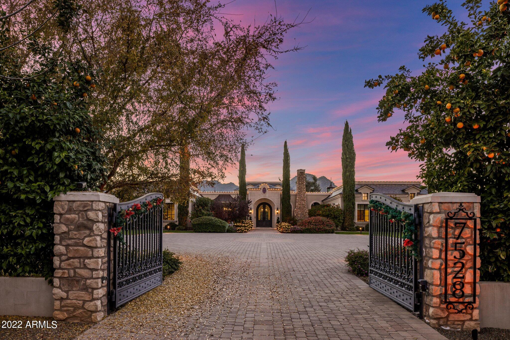 Quality, Size, Luxury and Privacy in the Town of Paradise Valley.     Close to the Ritz, easy access to shopping and dining yet secluded ,quiet and privately gated.  In the main home on one level there are 6 bedrooms including the owners suite and 9 bathrooms.  Along with the kitchen, greatroom, game room, office, library, sunroom and trophy room . On the lower level the theater, wine and bunk rooms plus 2 bathrooms can be found .    Casual Guest home is private and upgraded with full kitchen, laundry and 2 bathrooms. Pool house is elegant and convenient . 6 car garage , side entry with large turn around. One of a kind , must see estate.