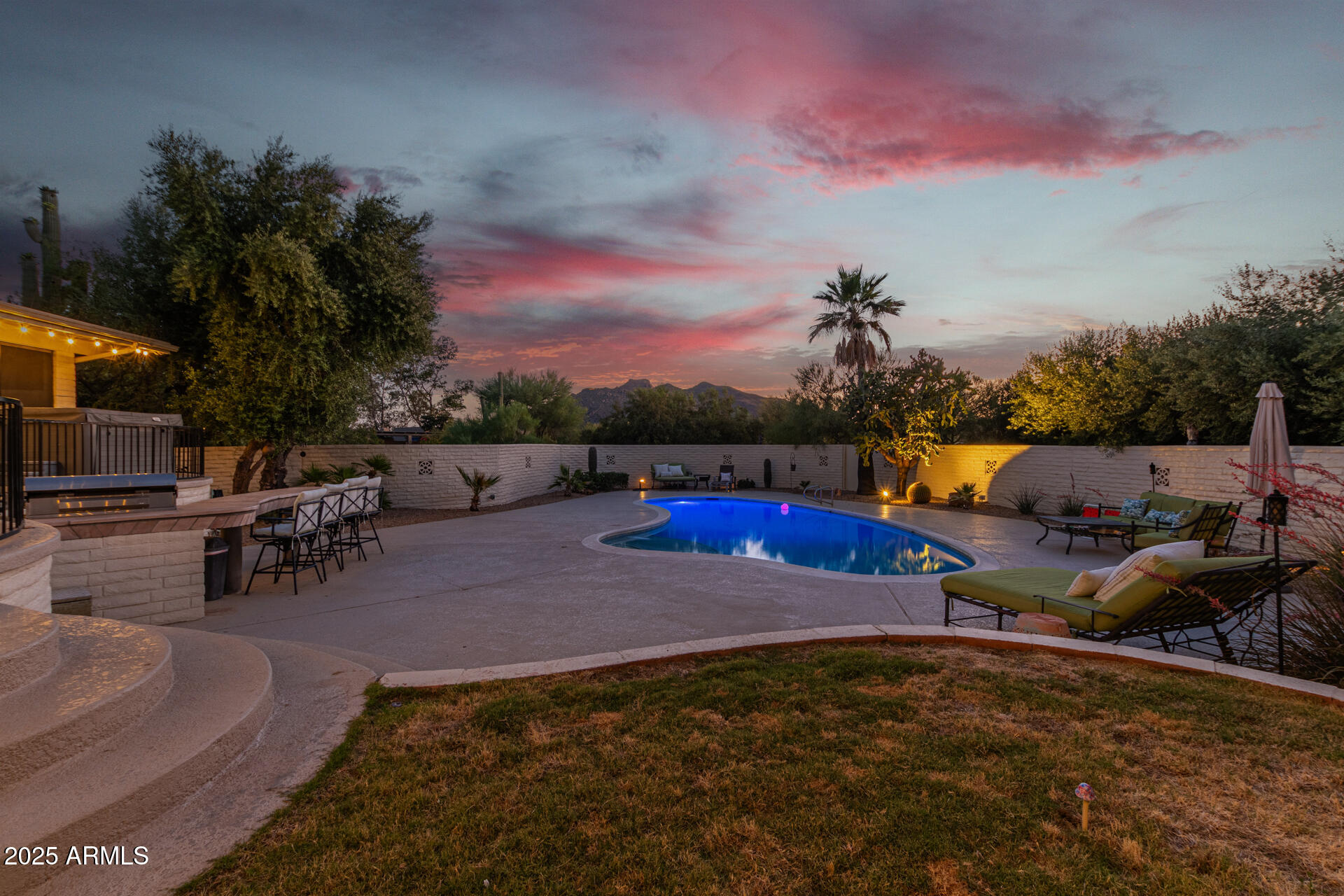 Welcome to a private desert retreat in beautiful Carefree, Arizona, set on a nearly 3/4-acre lot with mountain views and spectacular sunset skies, just minutes from the dining, golf, and shopping of North Scottsdale, Arizona and the charm of nearby Cave Creek, Arizona. 

Recently repainted and thoughtfully refreshed with a modern palette, this single-level home offers 3,052 square feet of comfortable living space, plus a relaxing Arizona room that adds additional indoor-outdoor enjoyment.

The backyard is the true highlight--an inviting oasis designed for the Arizona lifestyle featuring a sparkling pool, separate hot tub, expansive patios, and multiple seating areas perfect for entertaining or unwinding while watching the desert sky glow at sunset. Mature desert landscaping and privacy walls create a peaceful setting that feels secluded while still being close to everything.

Inside, bright living spaces flow comfortably for everyday living or hosting family and friends, with warm character, natural light, and excellent acoustics throughout. Major system improvements--including a newer roof, variable-speed HVAC system, updated electrical panel work, and new pool equipment--provide peace of mind and a solid foundation for the next owner.

With its private setting, spacious lot, and relaxed desert lifestyle, this property offers a rare opportunity to enjoy the beauty and tranquility of Carefree while remaining just minutes from the conveniences of North Scottsdale.

Arizona room adds additional useable space on top of the 3,052 square footage shown.