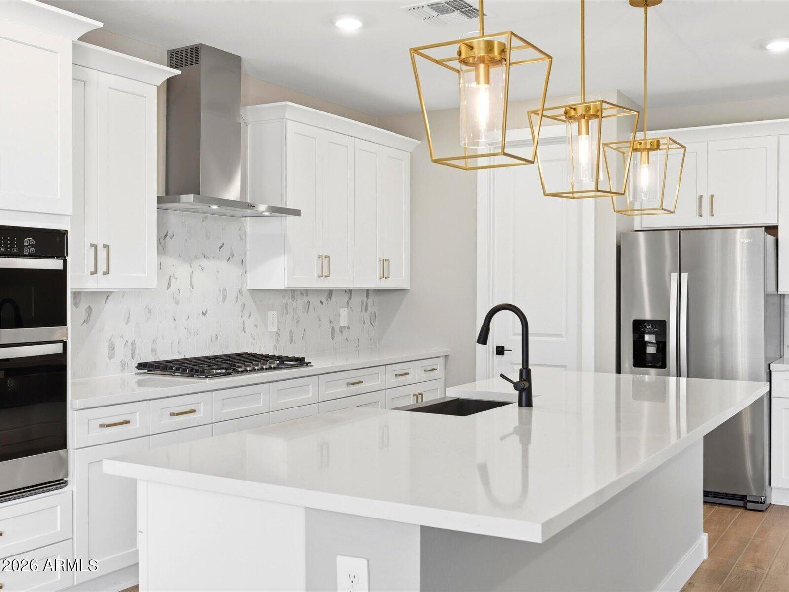 The thoughtfully designed Bailey Plus offers 5 bedrooms and 3 bathrooms, providing plenty of space for growing households or multi-generational living. The open-concept layout connects the kitchen, dining, and great room--ideal for entertaining--while a large island overlooks the main living area and adjacent covered patio. The gourmet kitchen and spa-inspired primary shower add a touch of luxury to everyday living, complemented by quartz countertops, white cabinetry, and wood-look tile flooring throughout main living areas. Generously sized bedrooms, each featuring walk-in closets, create a functional and flexible layout, while the private primary suite offers comfort and separation from the secondary bedrooms. Meritage homes are move-in ready with washer, dryer, refrigerator, and window blinds included. Residents will enjoy thoughtfully designed homes featuring flexible living spaces, covered back patios, and private primary suites for added comfort. Each of our spray foam insulated homes is built with innovative, energy-efficient features designed to help you enjoy more savings, better health, real comfort, and peace of mind.