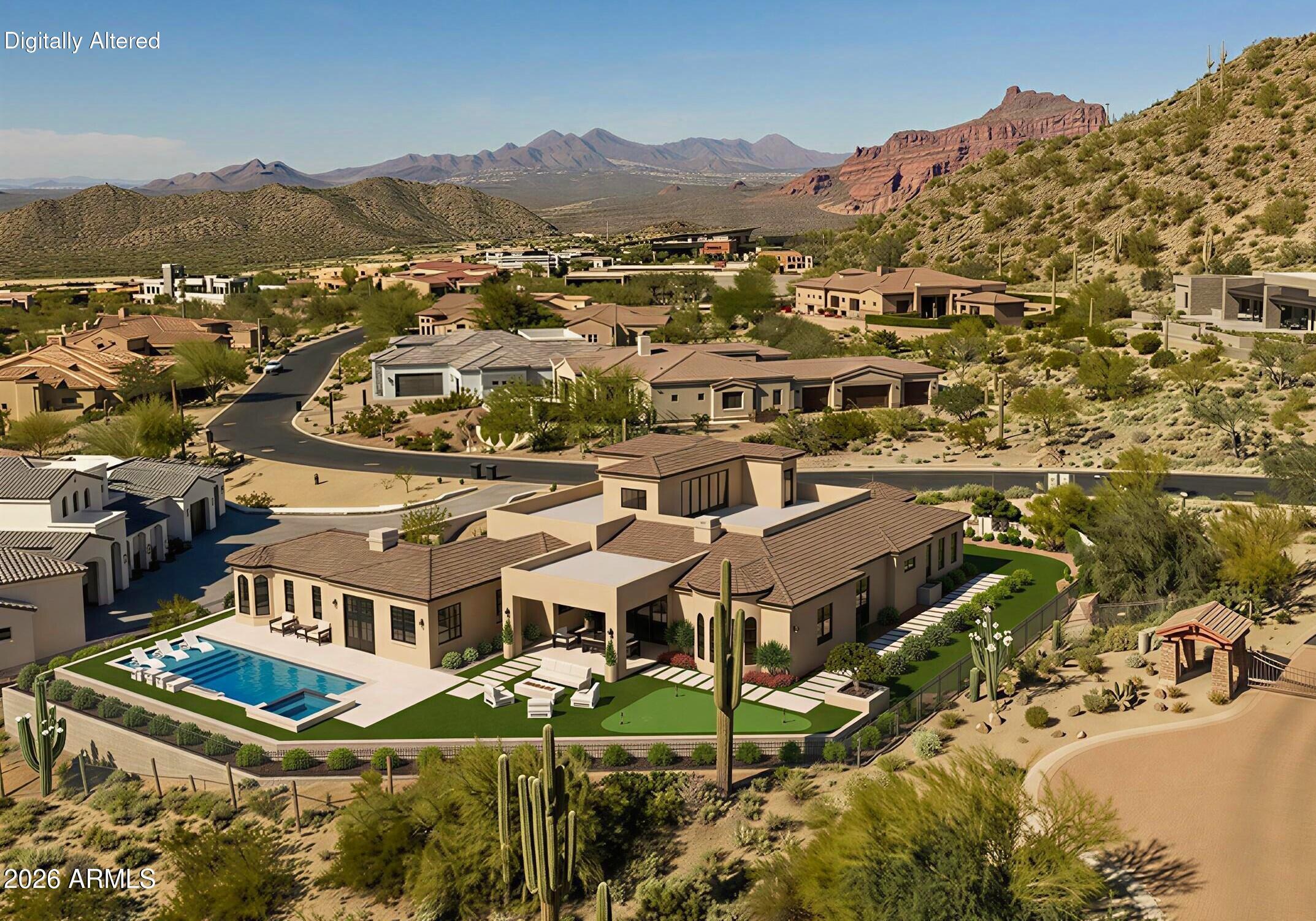 Commanding pristine panoramic views of desert and mountain vistas, including Camelback Mountain, Red Mountain and Usery Pass, this exceptional newly constructed home reimagines Spanish Revival architecture through a modern lens--crafted to meet today's conveniences and desires while honoring the romance of old-world design. 
Timeless elements such as arched passageways and windows, rich architectural details, and the use of natural materials are paired with a refined, updated aesthetic, while a welcoming front courtyard with breathtaking mountain views, intricate tilework and an outdoor fire feature create a warm first impression. Inside, a light-filled open layout reveals soaring ceilings and seamless indoor-outdoor living, all thoughtfully designed to showcase the home's breathtaking surroundings. The Chef's kitchen is appointed with a 30' Sub-Zero Refrigerator, 30' Sub-Zero Freezer, Wolf wall ovens, beverage refrigerator and a Pitt integrated gas cooktop.  Designer-selected white oak cabinetry and an oversized island accented by a visually stunning copper hood element blend performance with thoughtful design. A fully finished butler's pantry offers added counter and storage space perfect for culinary adventures and organization, and a main-level walkout deck just beyond the kitchen is the perfect place to dine al fresco or to add an outdoor kitchen.
A curated mix of wood, stone, and distinctive tile flooring adds warmth and texture throughout, while integrated smart home technology and energy-efficient systems deliver seamless, elevated living. The great room and adjacent living area share a dual-sided gas fireplace, offering the best of both worlds- open living spaces and a more private 'sanctuary' for living and entertaining. Glass slider doors connect to the expansive covered patio as it overlooks the lush desert surroundings beyond.  Imagine a back yard retreat with a stone-paved patio, desert landscape and dramatic evening lighting leading the way to a heated pool and spa, providing a serene setting to unwind while taking in the surrounding desert and mountain views. 
The primary suite offers a private retreat with a spa-inspired bath, pass-through shower with floor-to-ceiling tile and expansive walk-in closet. In another wing, guest quarters include a kitchenette, private bath, and separate entrance to the front courtyard--ideal for extended stays.
A grand staircase wraps around a private elevator that connects all levels, leading to an upper-level wellness retreat complete with a wet bar and powder bath. Expansive elevated decking extends the living space outdoors, creating an extraordinary vantage point to take in sweeping views and unforgettable Arizona sunsets--perfect for both relaxation and elevated entertaining. At the heart of the home on the main level is an open-air outdoor atrium with another intimate fireplace and a private staircase to the upper and bottom levels 
The lower level expands the home's versatility with a spacious garage offering 5 parking spots and storage, a media room/wine room which is pre-wired for customized temperature control, and an additional bedroom or secondary office--with a private entrance that creates a true away-from-it-all retreat within the home.
Blending old-world charm with modern refinement, this residence delivers an elevated living experience defined by design, comfort, and unforgettable views.  The home is ideally located just a few hundred feet from the Las Sendas Golf Course, a top rated-golf course that is recognized as one of the East Valley's premier desert courses, known for dramatic elevation changes, pristine fairways, and unforgettable Red Mountain views. 

Las Sendas is also celebrated for its active outdoor lifestyle, offering golf, pickleball and tennis courts, a private clubhouse, fitness center, multiple community pools, and miles of scenic walking/biking and hiking trails and parks woven throughout the community.  Las Sendas of Northeast Mesa is adjacent to the Tonto National Forest, featuring dramatic vistas and recreational activities like mountain and road biking, hiking, paddling/kayaking, boating, birding and more... yet it is an easy drive to downtown Scottsdale, Phoenix or Sky Harbor Airport.