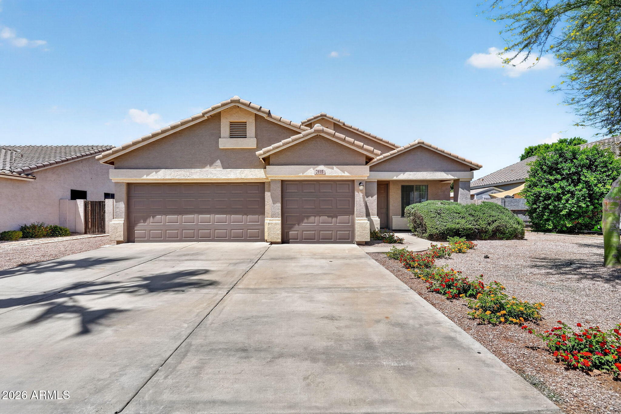 Located in a desirable Gilbert community, this beautifully updated 4 bedroom, 2 bathroom home features an open floorplan and thoughtful design throughout. Fresh landscaping updates and a spacious 3 car garage create inviting curb appeal. Inside, enjoy spacious gathering areas, brand new carpet, stunning new quartz kitchen countertops, brand new stainless steel appliances, a kitchen island, and pantry. The primary suite offers dual vanities, a separate tub and step in shower, and a walk in closet. Enjoy outdoor living under the covered patio overlooking the spacious backyard. Community amenities include biking and walking paths plus a children's playground. Do not miss this amazing Gilbert property.