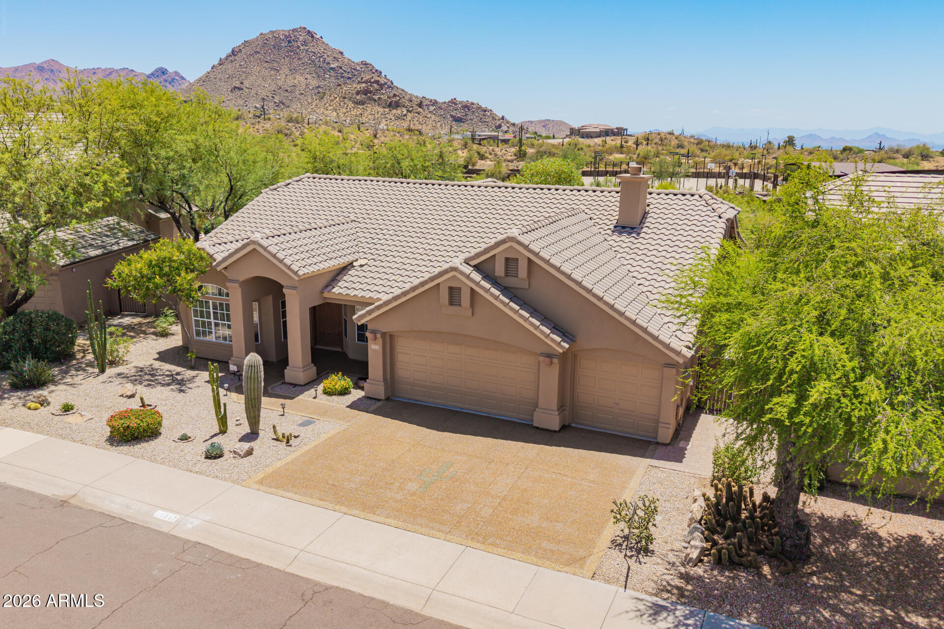 VIEWS!! Prime LOT LOCATION! One of the best lots in the entire community with unobstructed Mountain Views. The backyard oasis is as good as it gets with the sparkling pool & spa, with the perfect backdrop, large covered patio & very spacious. Private lot with north-south exposure, in a cul-de-sac & you can't build behind it. Three-car garage, 2,472 SQFT of living space with multiple living & entertaining areas. The extra half bathroom is located conveniently off the kitchen. Outstanding curb appeal. Fresh brand new interior paint & carpet in the bedrooms. Located in Echo Ridge at Troon North. Prime North Scottsdale location extremely close to well known Troon Country Club, top notch golf courses, exquisite hiking at Pinnacle Peak & The Four Seasons Resort. Do not miss this absolute gem! Pool & Spa are heated!