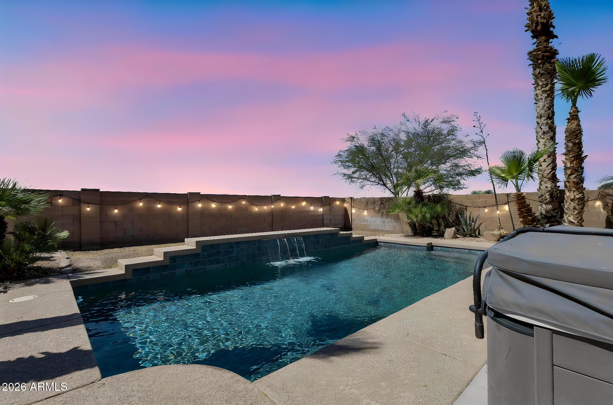 The best value for a single-story pool home in Parkside at Merrill Ranch has arrived. This true three-bedroom, two-bathroom residence features a highly desirable split floor plan that flows into an expansive open-concept family room and dining area. The gourmet kitchen is a chef's delight, anchored by a beautiful quartz peninsula island and equipped with a gas range and premium stainless steel appliances. Step outside to a private backyard oasis with no rear neighbors, where you can enjoy a sparkling pool, a relaxing hot tub, and plenty of patio space designed for grand-scale entertaining. The home is further enhanced by an epoxy-floored garage with a dedicated EV charging station and a solar lease for maximum energy efficiency. All of this is situated within the spectacular Merrill Ranch community, offering world-class amenities including a championship golf course, clubhouse, tennis and pickleball courts, a state-of-the-art fitness center, community pools, and a dedicated dog park.