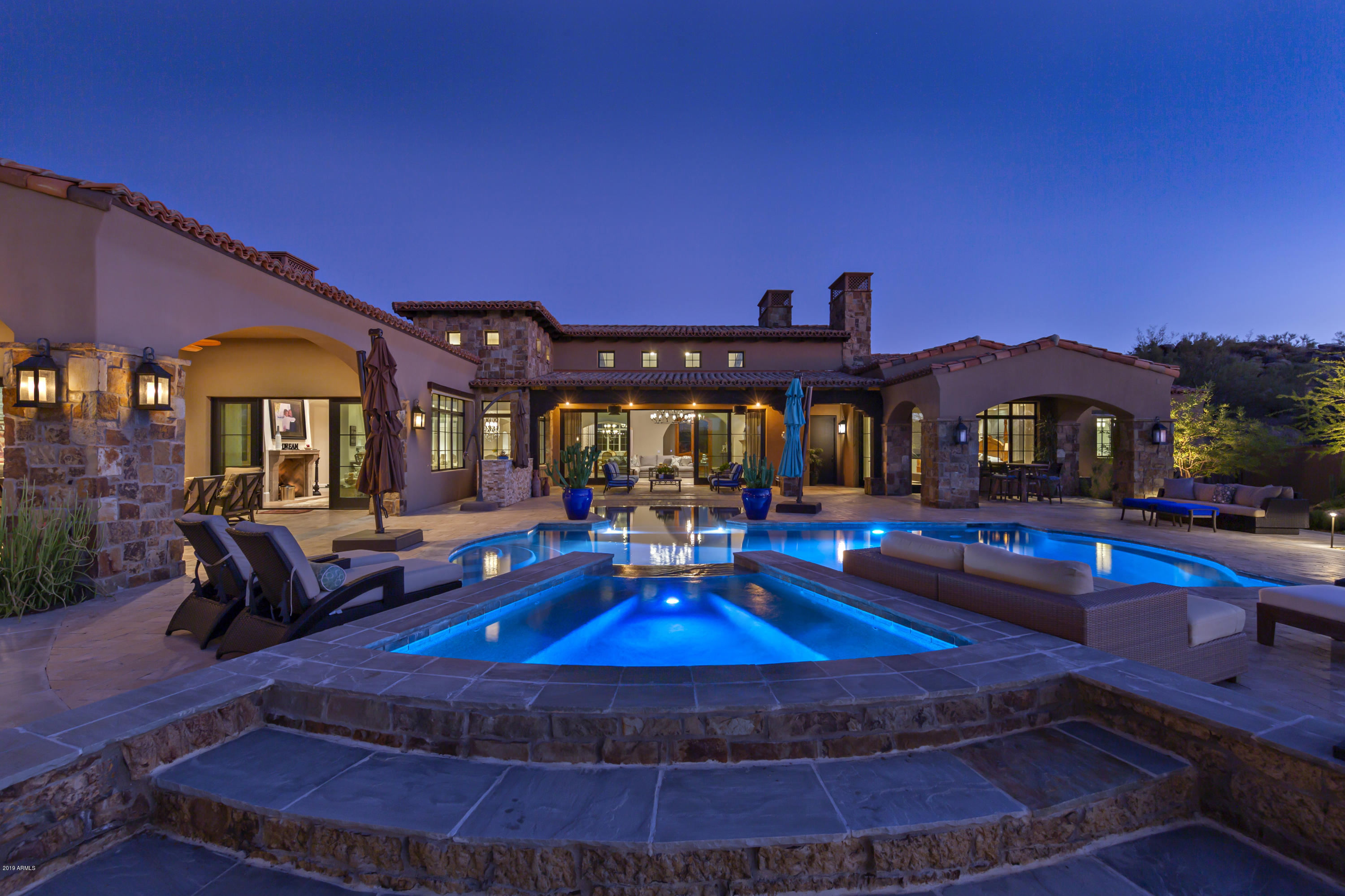 VACANT & EASY to SHOW * Modern Farmhouse Estate on a 2.8 acre lot located in the guard-gated community of Whisper Rock * Situated on one of the highest sites in the neighborhood, offering an abundance of views & privacy * Secluded & serene, the home greets you with an intimate courtyard complete with mature landscape and rock water feature * Modern floor plan & finishes all without a single step within the home * Groin value ceilings, massive beams, hardwood floors, custom light fixtures, furniture-grade cabinetry, multiple gas fireplaces & Wolf/Sub Z appliances * Separate master suite with fireplace, dual closets & access to the back patio * Wood-paneled office with massive granite desk * Media/game room with access to the back patio * Attached 2-room guest casita with kitchenette Incomparable outdoor living space complete with heated pool & spa, gas fireplace, built-in BBQ, generous covered patios and custom landscape design * Oversized 4-car garages with room for toys, etc. complete this residence *