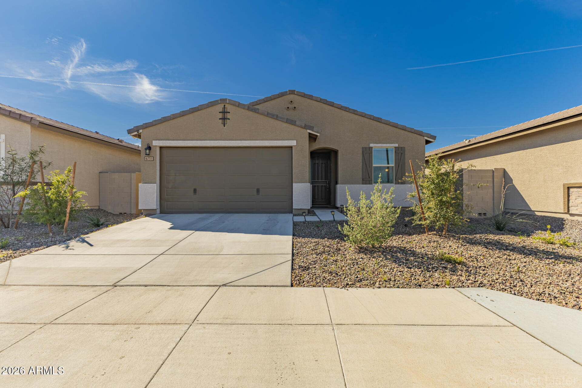 Built in 2022, this beautifully maintained 4-bedroom, 2-bath home in McClellan Ranch offers the benefits of newer construction without the added cost or wait. The open-concept layout is perfect for entertaining, featuring a spacious kitchen with modern finishes, ample counter space, a large pantry, and gas stove. A split-bedroom floor plan provides privacy and functionality for everyday living. The low-maintenance backyard is upgraded with premium turf, pavers, and a large gazebo... ideal for relaxing or hosting guests year-round. Conveniently located in Laveen near Loop 202, with easy access to both East and West Valley destinations, plus shopping, dining, parks, and outdoor recreation nearby.