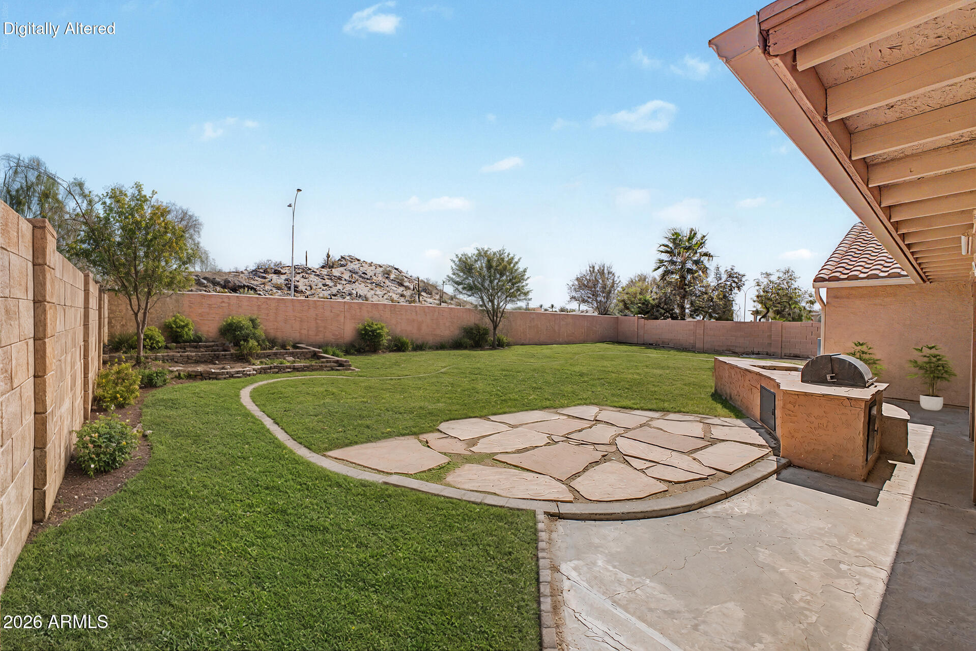 Experience the perfect blend of modern comfort & breathtaking scenery in this stunning, move-in-ready gem! Nestled in the highly sought-after Mountain Park Ranch community with top-rated Kyrene School District, this single-level sanctuary offers the lifestyle you've been dreaming of. You'll enjoy unparalleled access to hiking trails, greenbelts, playgrounds, 3 pools/spas, volleyball, tennis & pickleball, w/shopping, dining & major freeways just minutes away. Step through the front door into a bright, airy open floor plan defined by soaring vaulted ceilings. Greet guests in formal living & dining rooms perfectly positioned for sophisticated entertaining. The updated kitchen glows w/natural light, featuring newer appliances (all inc.) & a seamless flow into the expansive family living space. Featuring stylish wood-like laminate & tile flooring throughout, faux-wood blinds, ceiling fans, new dishwasher, stainless steel appliances, & center island in the kitchen, interior laundry room w/newer washer & dryer (inc.), added gutters for drainage, security lights on a timer outside of garage, owned security system & water softener. 

Forget the stress a "fixer-upper" brings. This home has been meticulously maintained w/significant upgrades: Full interior & exterior refresh (2022). Updated plumbing in bathrooms (2022). Soft water system & newer water heater (2019). A/C & furnace (2014) & roof (2013).

The primary suite features a unique "bonus" ensuite- perfect for a nursery, home office, or 4th bedroom (can be easily walled off for added privacy)! The ensuite bathroom has been updated w/a tiled shower, separate soaking tub, dual sinks, & generous walk-in closet. 

The spacious backyard is an entertainer's paradise designed to maximize the Arizona sun. Enjoy picturesque mountain vistas from your massive covered patio. Fire up the built-in BBQ for weekend cookouts.

A 2-car garage w/built-ins offers the perfect place to park & store all of your extras. 

Living here means access to world-class amenities, including sparkling pools & spas, sports courts, "tot lots," & winding trails. Prime access to the 202 & I-10, making your commute a breeze. This home is move-in ready and priced to sell. Do not miss this rare opportunity to live in a premier community that you won't want to leave!