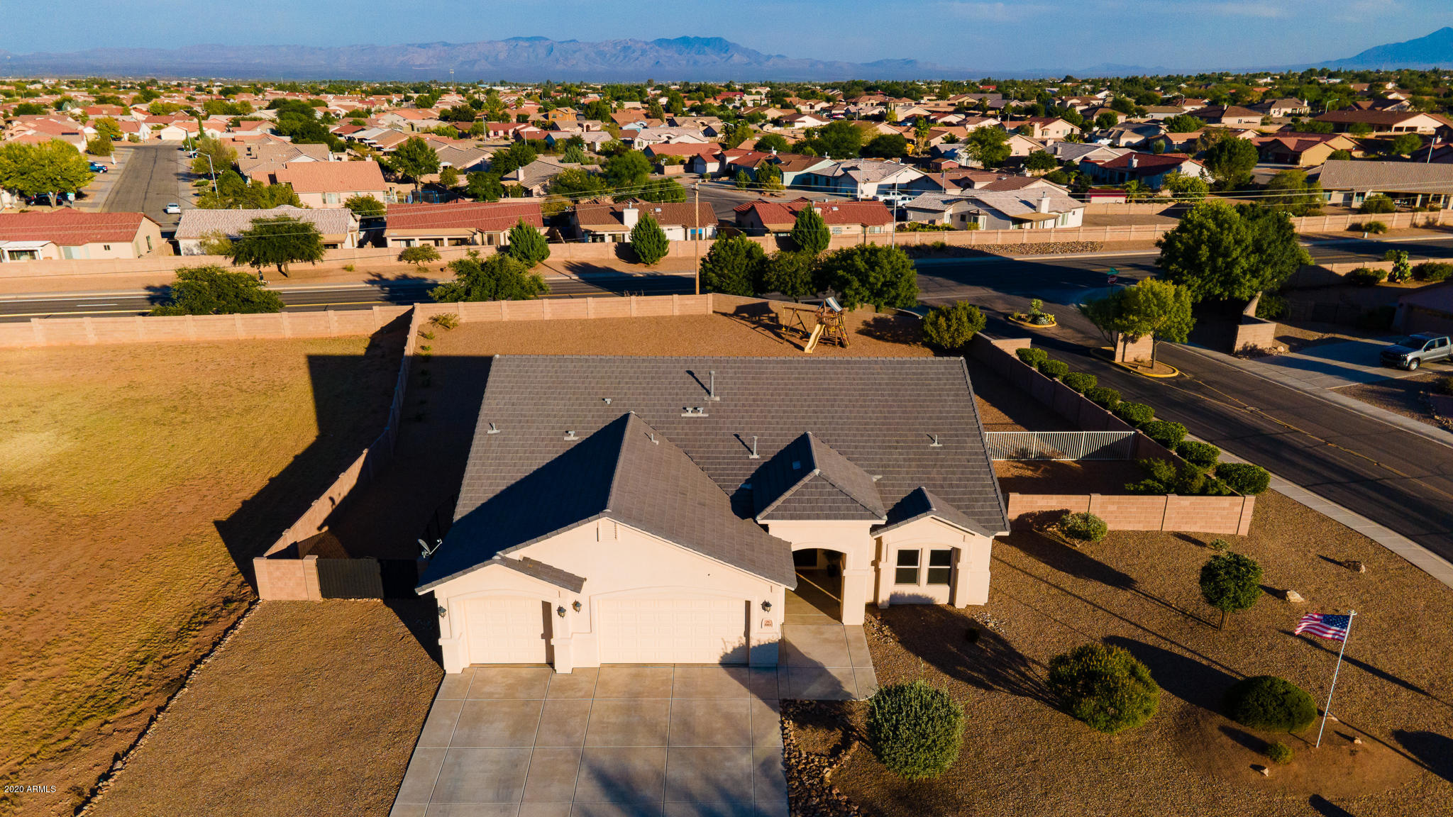 Look no further, YOU have just found your DREAM HOME!  This custom built Sun Canyon Home is located in the very desirable subdivision The Reserves @ Canyon de Flores.  It sits on an oversized corner lot just over a half acre and has the most incredible views of the Huachuca Mtns. The 2413 sqft home features an open concept kitchen, dining and living area that is perfect for entertaining and family gatherings. The kitchen is designed for any inspired home chef with stainless steal appliances and granite countertops. It offers a split floor plan with 4 beds 3 baths with two being master suites.  You will be in AWE of the over sized custom walk in dual shower in the larger master bedroom. Other features are a 3 car garage, covered patio, dog run, double gate, and more. Don't wait!  Call TODAY