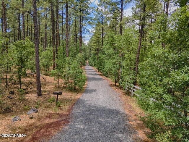 This listing is a total of 3 parcels combined for total acreage of 7.58. 
Premier home building site in the heart of Pinetop. 3 different parcels offering lots of privacy and seclusion, with amazing views of the town of Pinetop, as well as the Rim & Reservation. Home sites may have 2 buildings on each 1 acre parcels (main house, no max square foot, guest house 1200 sf max). Horses approved! Seller has brought electric and water up to property line. 
 Parcel #s 311-44-018H 1.48 acre 
311-44-018G 3.2 acre 
311-44-018F 2.9 acre