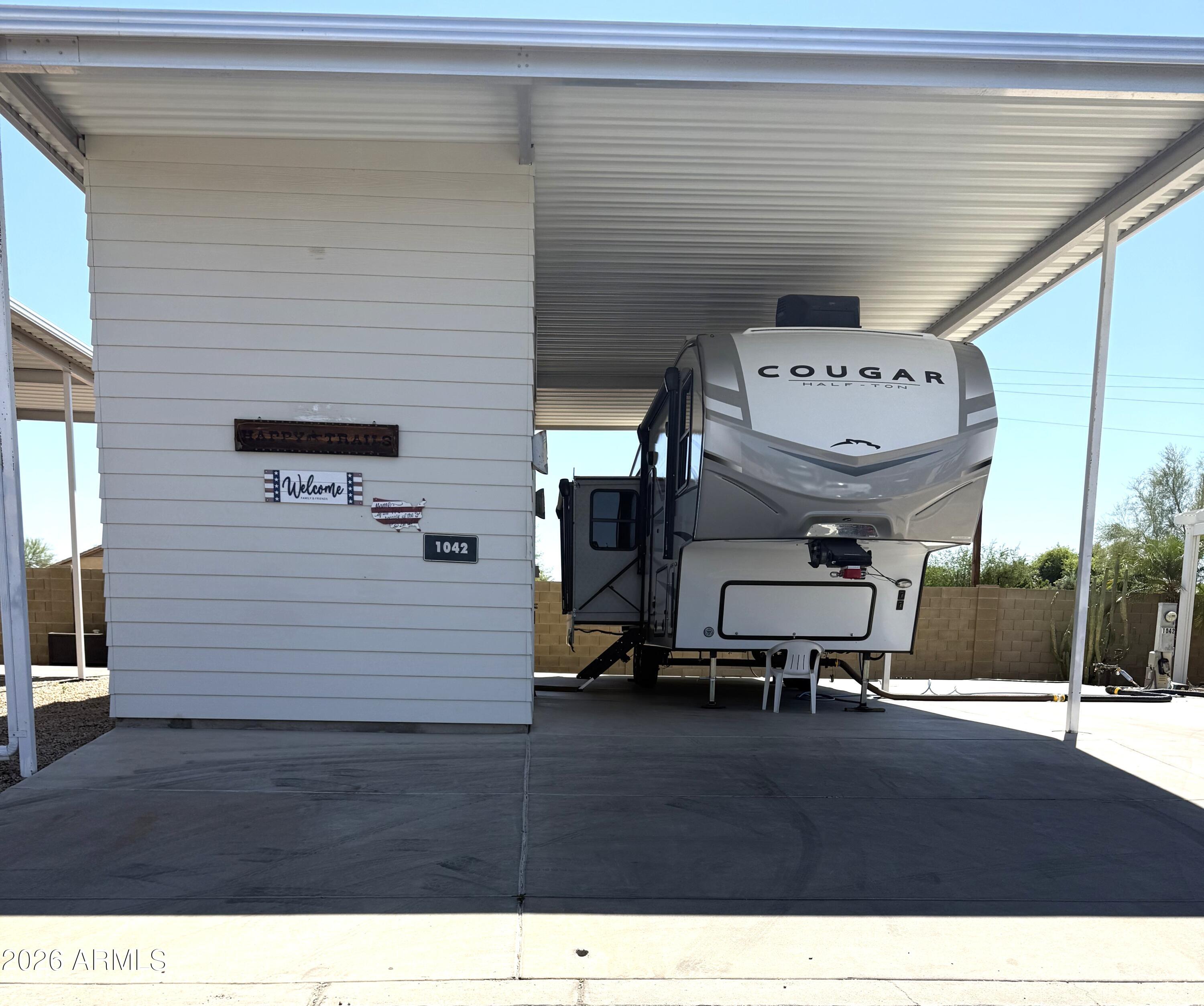 The perfect package awaits!!!   A 2024 Keystone Cougar fifth wheel that is included as a package deal. The perfect size  RV-33 ft- for your home during those winter months in the Arizona sunshine. It is packed with all the Cougar premium features.  The decor is so pleasing and the configuration is first class. Situated on a large RV lot that has a covered patio area for privacy and entertaining.  The shed  has been newly remodeled and contains a shower, toilet, refrigerator and a washer/dryer. Lots of storage upstairs in the two story shed to keep all your belongings or create your own little Nitch .  

Professional pics coming soon.