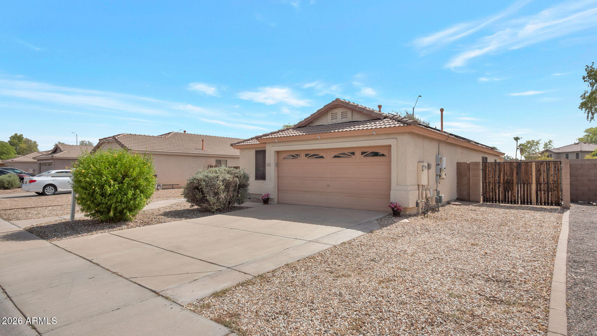 PEORIA HOME, DOUBLE RV GATES • Prime 85383 
Great starter home featuring 3 bedrooms, 2 bathrooms in the highly desirable 85383 zip code. Enjoy a low-maintenance yard, perfect for easy living. Property includes an RV gate for added flexibility. NO HOA, YES NO HOA  Conveniently located near shopping, dining, parks and freeway access, with highly rated schools nearby. Minutes away from Lake Pleasant and all lake activities you seek.  Ideal for first-time buyers or anyone looking for a practical, well-located home. Add leased solar for money saving power bills.