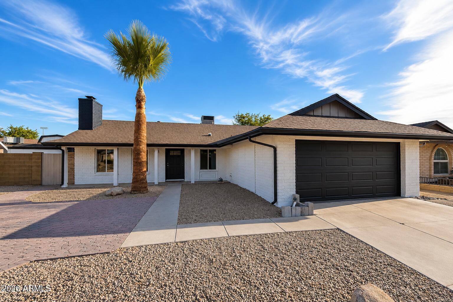 Great neighborhood in Glendale,  features dramatic vaulted ceilings and a cozy fireplace that creates the perfect focal point for relaxing or entertaining guests. The separate family room opens seamlessly to the kitchen. open concept floor plan with luxury wood-look flooring, recessed lighting, modern ceiling fans, and designer finishes throughout. The fully renovated kitchen is a true showstopper, featuring white shaker cabinets, quartz countertops, stainless steel appliances, brushed gold hardware, custom blue tile backsplash, and a spacious breakfast bar perfect for entertaining.

bathrooms have been thoughtfully updated with dual vanities, marble-style countertops, modern fixtures, and a sleek glass-enclosed shower with elegant gold accents. Large picture windows fill the home w