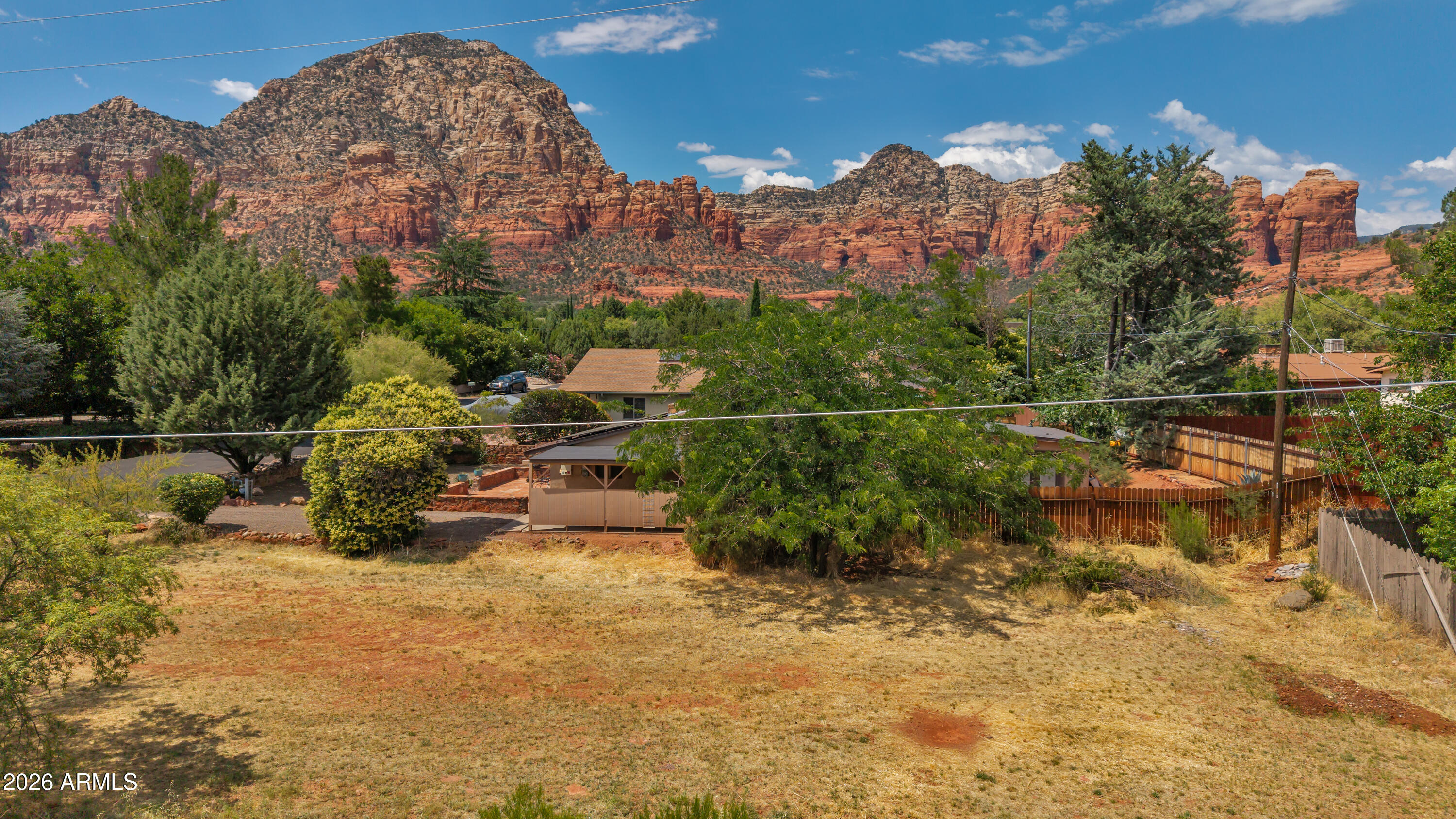 Fabulous build site in the highly desirable Coffee Pot subdivision of West Sedona. Build your custom Sedona retreat and enjoy beautiful Red Rock views of Coffee Pot, Thunder Mountain, Sugarloaf and Chimney Rock right from your own backyard. Property is staked, so drive by and imagine the possibilities. City sewer, AZ Water Co., electric and natural gas are available, so there is no need to install a septic or drill a well. Prime West Sedona location just 0.4 miles from Sugarloaf Trailhead, 0.7 miles from Amitabha Stupa and Peace Park, and 1.6 miles from Posse Grounds Dog Park. Enjoy nearby hiking, parks, dining, shopping and West Sedona amenities. Buyer to verify all facts, utilities, zoning and building requirements. No HOA or CCRs.  Short term rentals OK.