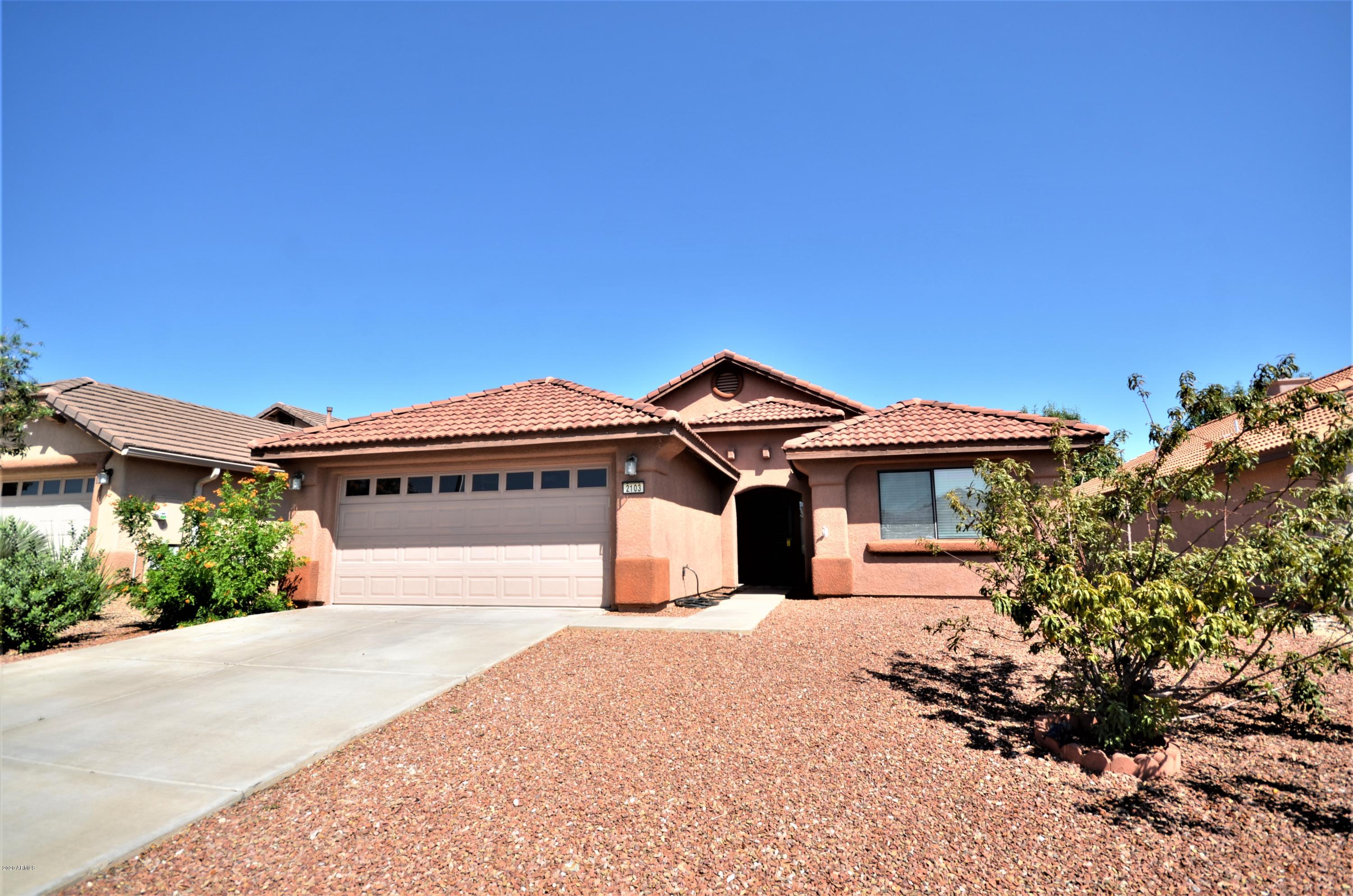 Beautiful 3 bedroom 2 bath home with spacious open airy floor plan.  New wood laminate floors throughout with carpet in the bedrooms. Oversized covered tiled porch that extends from one side of the house to the almost the other and is perfect for BBQ's and entertaining.  Great neighborhood and waiting for YOU!  Call today to schedule a showing!
