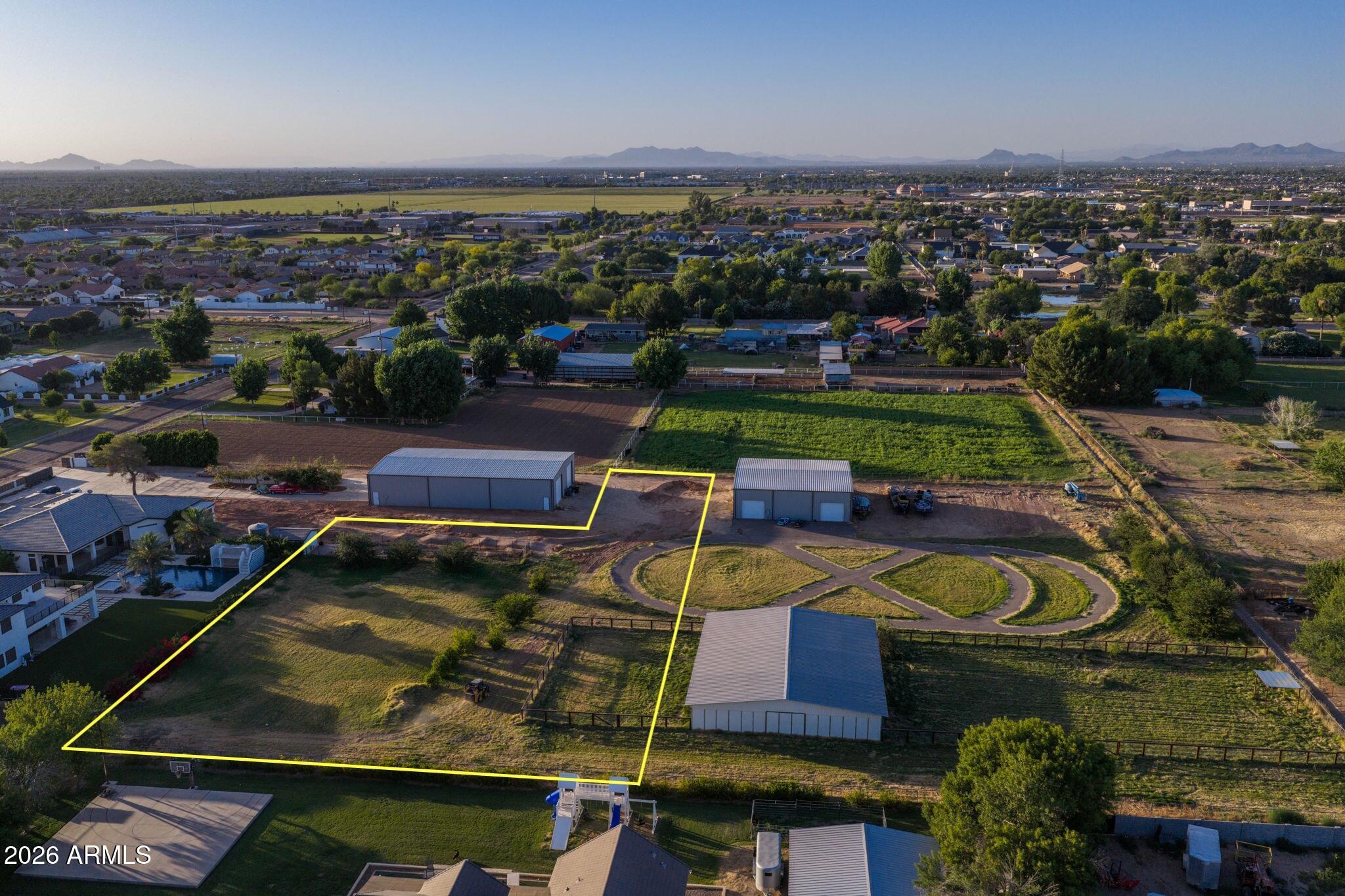 Build the custom home you've always dreamed of on this beautiful 1.14-acre homesite located in one of Gilbert's most desirable county island neighborhoods. Surrounded by impressive custom estates and offering the freedom of no HOA, this parcel provides the ideal setting for a luxury home with space to breathe. Design the backyard you've always wanted with a pool, detached RV garage, guest house, outdoor entertaining spaces, or even horse facilities--horses are welcome. Enjoy the privacy and charm of an oversized homesite while remaining just minutes from Gilbert's best shopping, restaurants, highly rated schools, and freeway access. Opportunities to build on acreage in Gilbert continue to disappear, making this an exceptional chance to create a home tailored to your lifestyle.