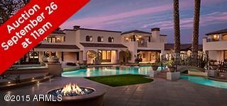 There are homes and there are showpieces and this palatial estate is definitely the latter.  This unique masterpiece sitting on 3 lush acres, with 33,000 square feet of living space under roof is so grand it will take your breath away, yet each and every room is brilliantly created with exceptional warmth and exquisite taste. Every thoughtful space has its own distinct design elements, each one more impressive than the last and the outstanding finishes were provided by the renown JR McDade Company, Inc. Whether grand scale entertaining, spending the day relaxing on the lazy river, sharing cocktails at the bar in the billiards room, watching a movie in the gorgeous theatre, or simply enjoying a private meal on one of the many fabulous verandas, long lasting memories are destined to be created in this magnificent home.  The luxurious private guest quarters offer the same extraordinary elegance as the main residence, and the flawless grounds, along with the stunning patios and courtyards create a truly opulent environment. Deliberately built to capture the glorious mountain views from every vantage point, the setting is nearly inconceivable. This timeless estate is for those who desire and appreciate the finest things in life and are ready to live it to the fullest!