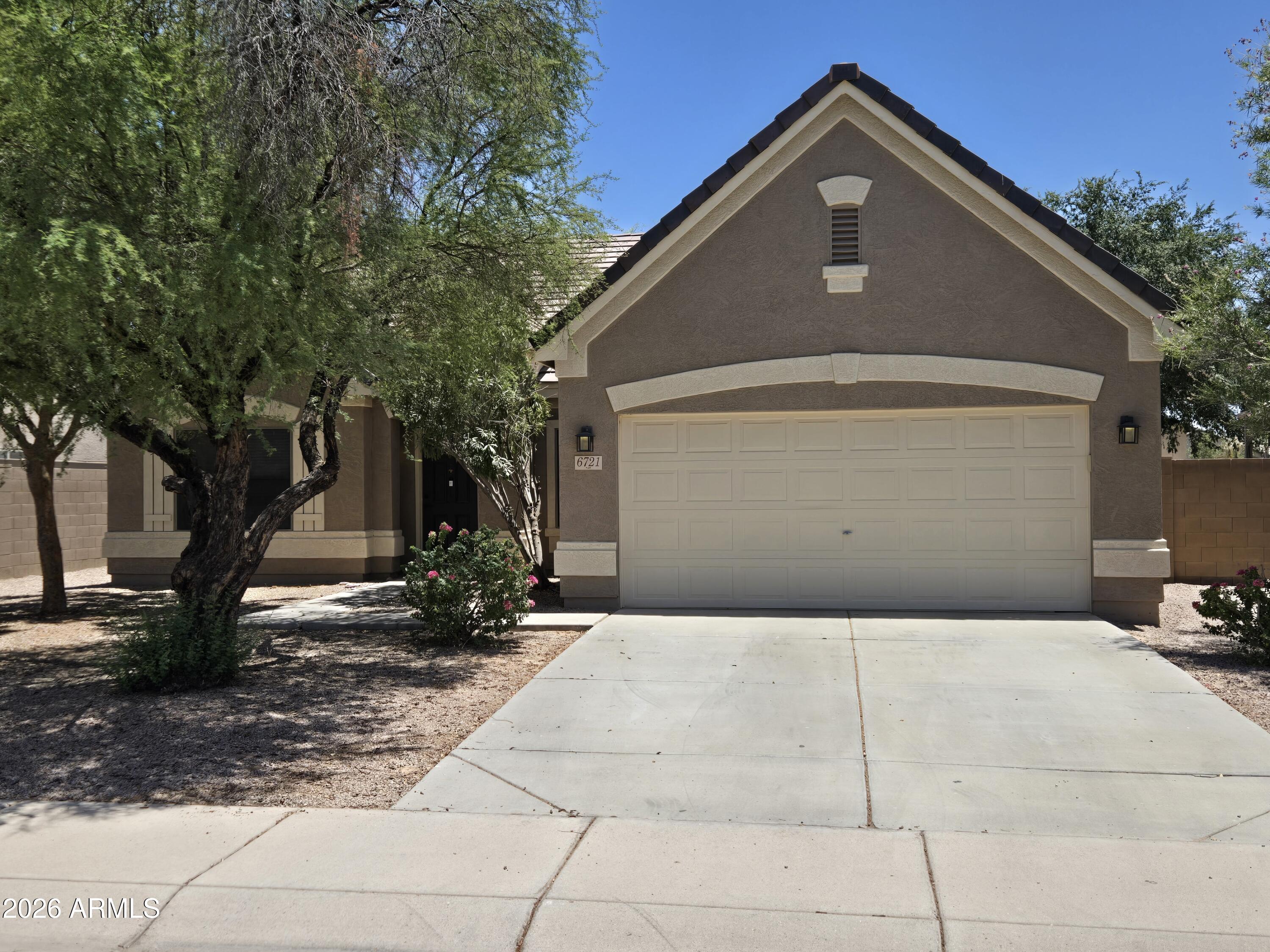 Home in popular community of Cooper Commons that has just been painted and has brand new carpet. The house is located on a premium lot backing to the desert greenbelt.   Spacious 3 bedroom/den floorplan with lots of living space and big kitchen with island that opens to the family room.  Enjoy the big backyard or if you need more space the community park and Hull Elementary School are just a 5-minute walk from your front door.