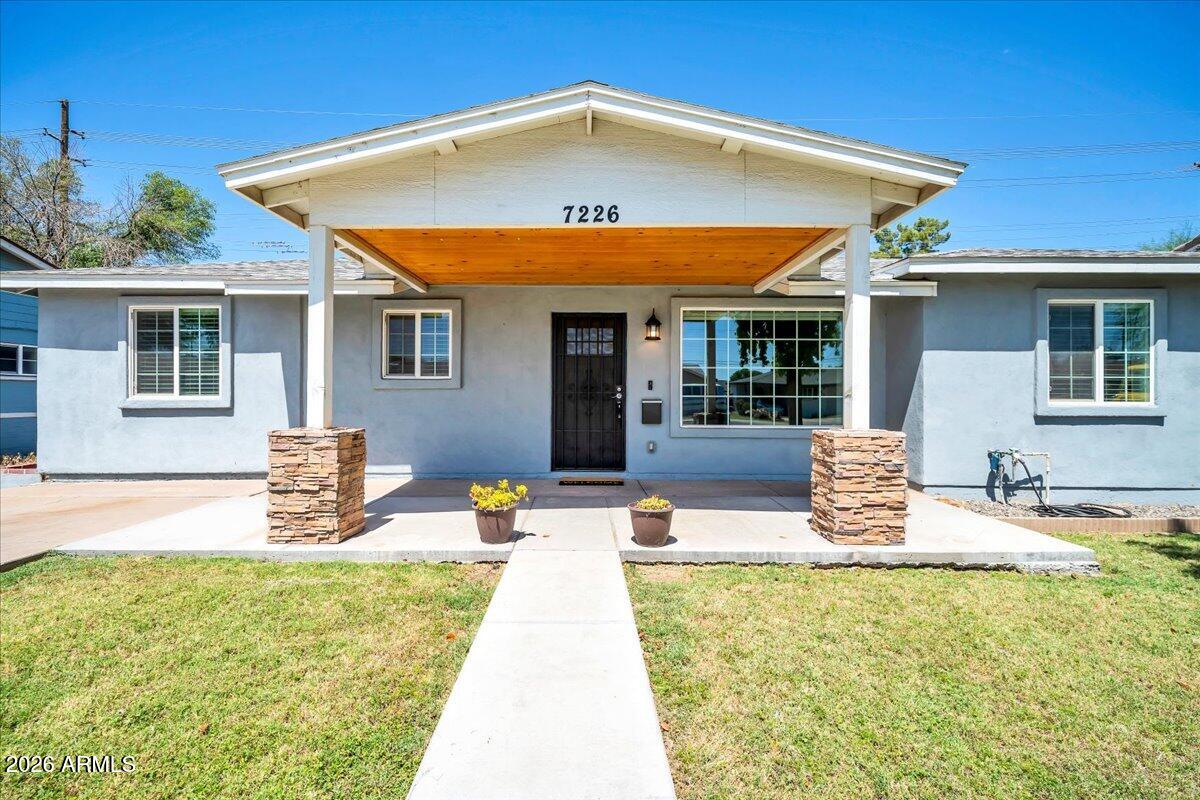 Beautifully remodeled 4-bedroom, 3-full bath home offering 1,905 SF of modern living space in a convenient North Phoenix location. Renovated in 2018, this move-in-ready property features an open-concept floor plan, spacious living and dining areas, and a stunning kitchen with white shaker cabinets, quartz countertops, stainless steel appliances, and a large island. Rare for the area, the home includes three fully remodeled bathrooms with matching designer finishes throughout. Tile flooring extends through the main living spaces, with carpet in the bedrooms for added comfort. Situated on an approximately 6,100 SF lot with mature shade trees and attractive curb appeal. Close to shopping, dining, parks, schools, and freeway access.