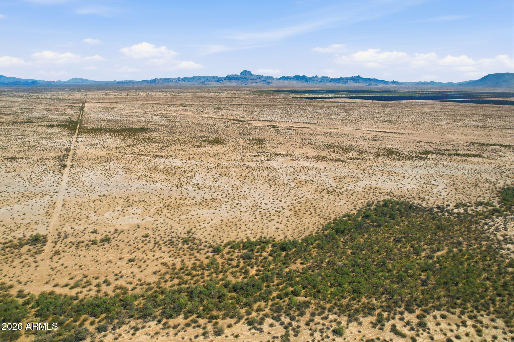 Great Land Investment in Harquhala Valley Tonopah! Approx. 20 acres, which is only $4,000/acre! Zoned RU43, ready for your private ranch, homestead, or subdivide into four 5-acre parcels. Horses allowed. Flat/level lot. Located in Tonopah, about 15 minutes drive time from I-10 and not too far from Buckeye and the Phoenix Metro. Amazing mountain views! Great water in the underground aquifer. Priced low for a quick sale. Low Taxes (only $253 for 2025). Don't let this opportunity pass you by, make an offer today! NOT in a flood zone. No Seller Carrybacks or Seller Financing at this time. APN: 506-22-009. GPS Coordinates: GPS 33.50796380635678, -113.209194570826