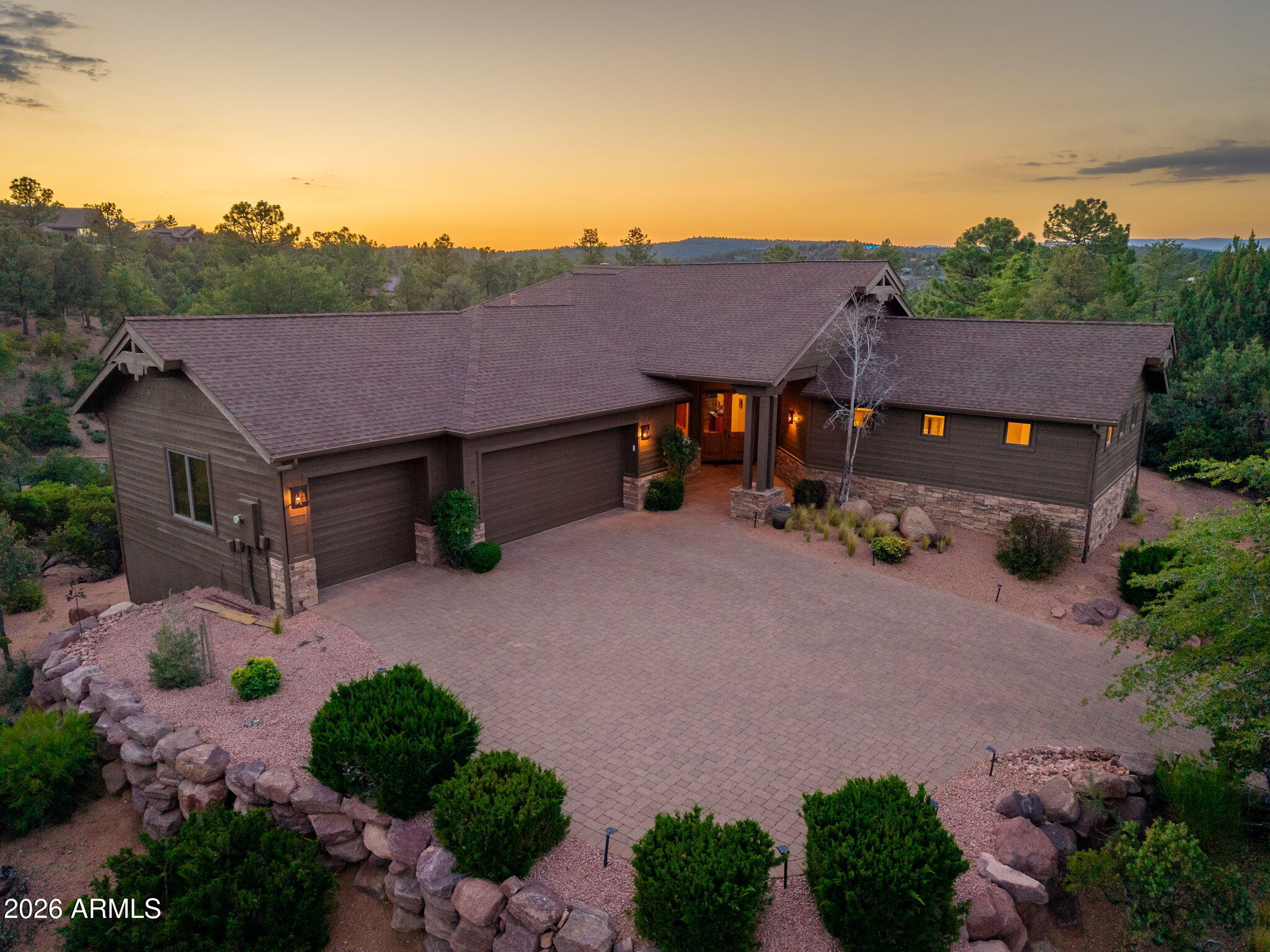 Located within the gates of the private golf country club community of Chaparral Pines, this beautiful single-level home offers 3 bedrooms plus an office that can easily serve as a 4th bedroom.
Set on a .65-acre homesite with breathtaking Mogollon Rim views, the home combines mountain luxury with comfort and functionality. An oversized 3-car garage provides plenty of room for vehicles, storage, or outdoor gear.
Inside, you'll find beautiful wood flooring throughout the main living areas and brand-new carpet installed in the bedrooms in May 2026. The exterior has also been recently painted, giving the home a fresh and well-maintained feel. The gourmet kitchen features granite countertops, knotty alder cabinetry, double wall ovens, gas cooktop, beverage cooler, and a massive island with pendant lighting.
Expansive patio spaces take full advantage of the incredible Rim views and include a built-in BBQ, creating the perfect setting for outdoor dining, and entertaining.
Additional custom touches include knotty alder doors, wood-framed windows, and sliding doors throughout the home, adding warmth and character.