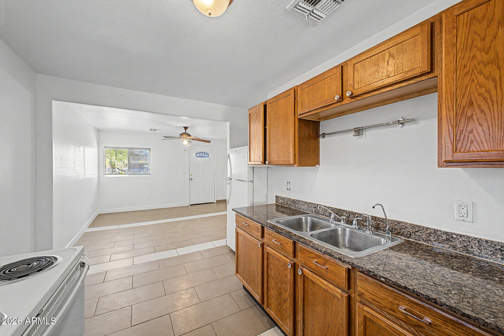 Freshly updated 3-bedroom, 1-bath home conveniently located in the heart of Phoenix. The interior has been freshly painted, creating a clean and inviting living space. The property features an RV gate with additional space for parking, storage, or outdoor enjoyment. Enjoy easy access to Downtown Phoenix, located just minutes away, along with Phoenix Sky Harbor International Airport, shopping, dining, entertainment, and major freeways. Whether you're a first-time homebuyer or an investor looking for a centrally located property, this home offers outstanding potential and convenience.
