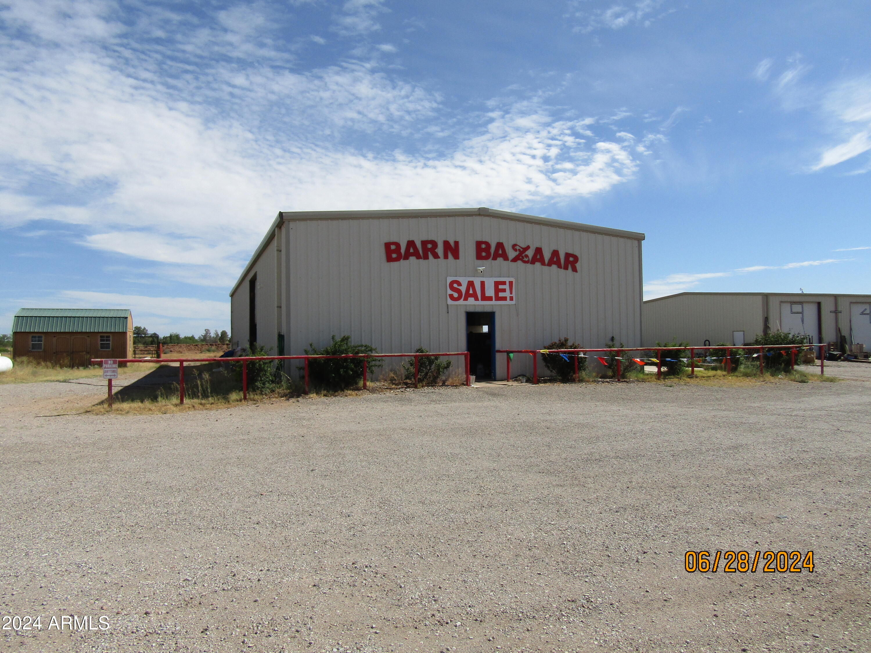 The busiest intersection in Palominas/Hereford. 1325' frontage on hwy 92 and 750' on Palominas Rd. Two steel buildings, 100x45 and 80 x45. two wells, 1 is 6'' and 1 is 12'' 600 gpm. Right near the San Pedro Riparian National Conservation Area, Lehner Mammoth Site and about 1/2 way between Ft. Huachuca & Bisbee.  Having 28 usable acres, it may be the perfect spot for an RV Park or RV repair facility. Two manufactured homes w/ pad rental, both metal buildings rented. Other spots on the property have had homes previously, ability to use those is unknown. Current rents total $2600/month. Good income while building something else. Great for a farm, multiple lots/buildings, Veteran's Village, with room for self sustaining work shops, housing, farming, &  all kinds of wonderful.