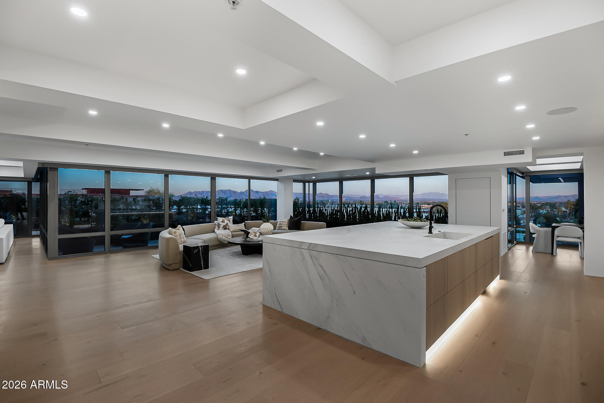 Introducing Arizona's Most Iconic Penthouse Condominium, the crown jewel of Old Town Scottsdale, a residence that redefines luxury living. This Top-Floor Corner-Unit Penthouse is the largest condominium in all of Old Town Scottsdale. After almost a year - this unit has been fully transformed - undergoing the most high-end ultra-luxury floor-to-ceiling remodel imaginable. Every detail has been meticulously curated to the highest standard of design, craftsmanship, and sophistication. Photos do absolutely no justice to this one-of-a-kind masterpiece - it's simply a must see in person property! .

-The largest condominium in Old Town Scottsdale 

-Top Floor Penthouse Corner Unit

-Unbelievable McDowell Mountain Views

-No shared walls & no-one above you

-4 Private Patios 

-4 Parking Spaces 

-240 electric vehicle charging outlet 

-Private storage room attached to elevator lobby

-Massive Primary Suite Sanctuary 

-6 Brand New 2025 HVAC UNITS

-Shinnoki All-natural wood cabinetry FROM BELGIUM

-Shinnoki All-natural wood doors FROM BELGIUM 

-Allora All-natural wood flooring FROM ITALY (Throughout entire property except full baths)

-Raw steel custom planter box's bordering all private patios

-Magnifica Encore Honed Luxe White Stone Integrated Sinks (Kitchen, Bar, Laundry, Primary Bath & All 3 Guest Baths)

-Magnifica Encore Honed Luxe White Slab shower walls & matching floor tile in Primary 

-Magnifica Encore Honed Luxe White Tile wrapped guest baths (all walls & flooring)

-Sub-Zero Wolf Appliance Package 
(36" Designer Column Refrigerator - Panel Ready , 24" Designer Column Freezer with Ice Maker -Panel Ready, 48" Sealed Burner Range top, 30" E Series Transitional Built-In Single Oven, 30" E Series Transitional Speed Oven, 24" COVE Dishwasher - Panel Ready, 30" Designer Wine Storage - Panel Ready, 30" Designer Refrigerator Drawers - Panel Ready, 30" Designer Refrigerator/Freezer Drawers with Ice Maker - Panel Ready)

-Custom accent lighting under all cabinetry, integrated into all mirrors, integrated into all floating shelves (stone & wood) and integrated into all shower niches.

-iPhone & Alexa Integrated Smart Home (Featuring 20 in-ceiling Triad speakers, Lutron Caseta luxury smart lighting, Hunter Douglas automated blinds, Samsung Frame Art TV's, Nest Thermostats & Modern Flames Luxury Fireplaces)

-All found within the luxurious Optima Camelview Village, with it's unbeatable location & state of the art architecture/amenities. Amenities include: Two Outdoor Zen Pools, Spas & Bbqs
One on each side of the community (heated year round). 24,000 sq. ft. Fitness Center (Recently Remodeled). Mens & Women's Locker Rooms w/ Saunas, Showers and Private Lockers. Indoor Lap Pool & Spa (Heated year round), Cold Plunge, On-site concierge, Putting green, Hybrid Basketball / Pickle-ball Court, Racquet ball court, On-site restaurant (metropolis), conference room, 24/7 Security, Reservable party room and multi-purpose fitness/yoga room.