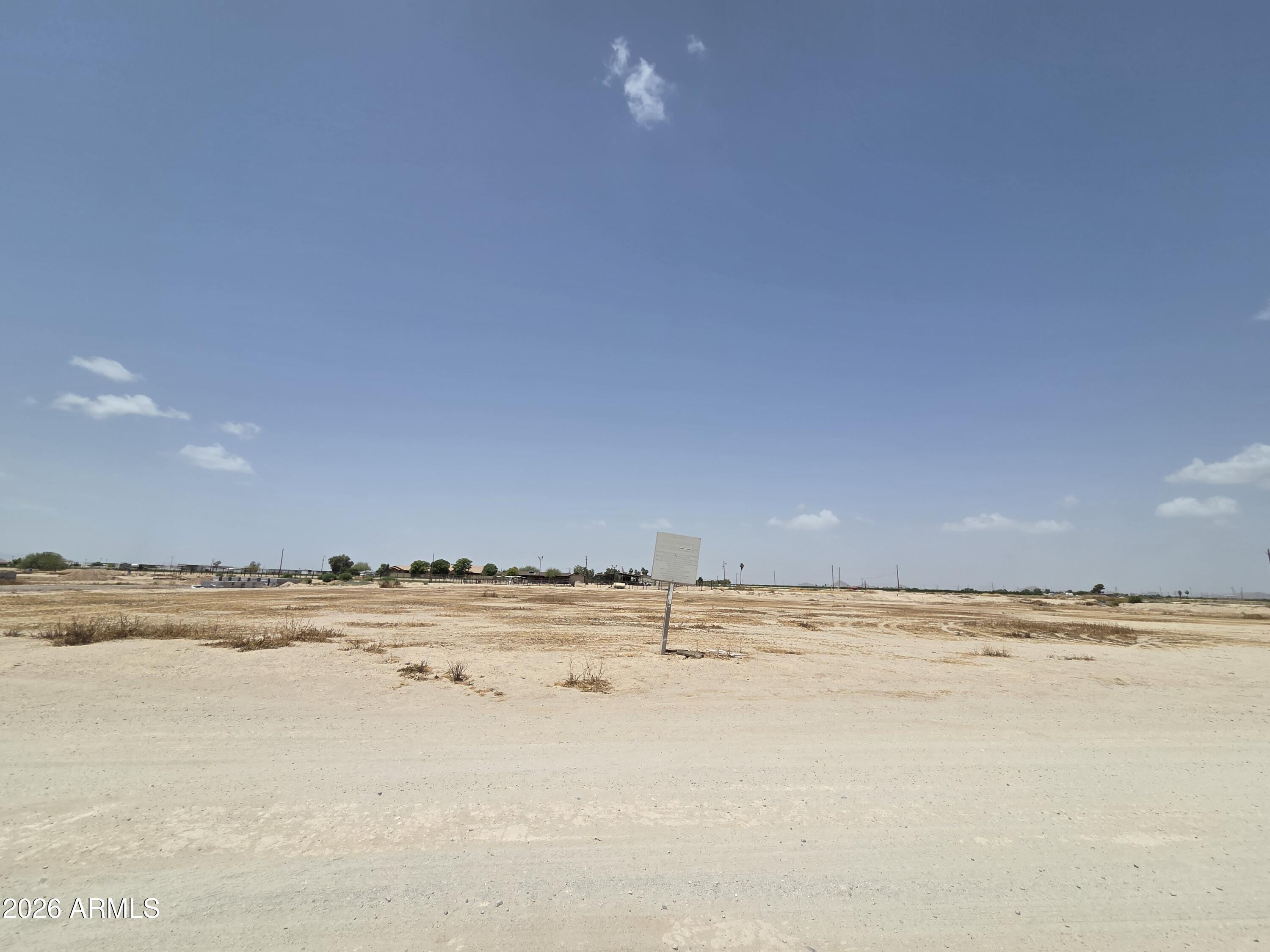 Build your dream home on this spacious 1+ acre lot in the growing area of Buckeye near Southern Ave & 225th Ave! Enjoy the freedom of wide-open space with endless possibilities for custom homes, workshops, RV parking, toys, horses, irrigation rights and more. Surrounded by beautiful desert views and Arizona sunsets this property offers the perfect blend of peaceful country living with convenient access to major roadways, shopping, dining and the continued growth of the Buckeye area. Just a mere 15 minutes from Verrado Marketplace and right next to the future State Route 30 that will connect Buckeye to Loop 303.